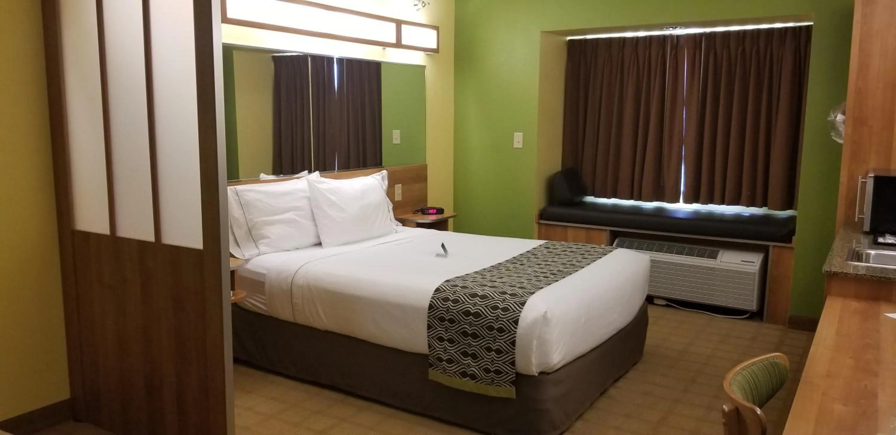 Bed in Microtel Inn & Suites by Wyndham Delphos