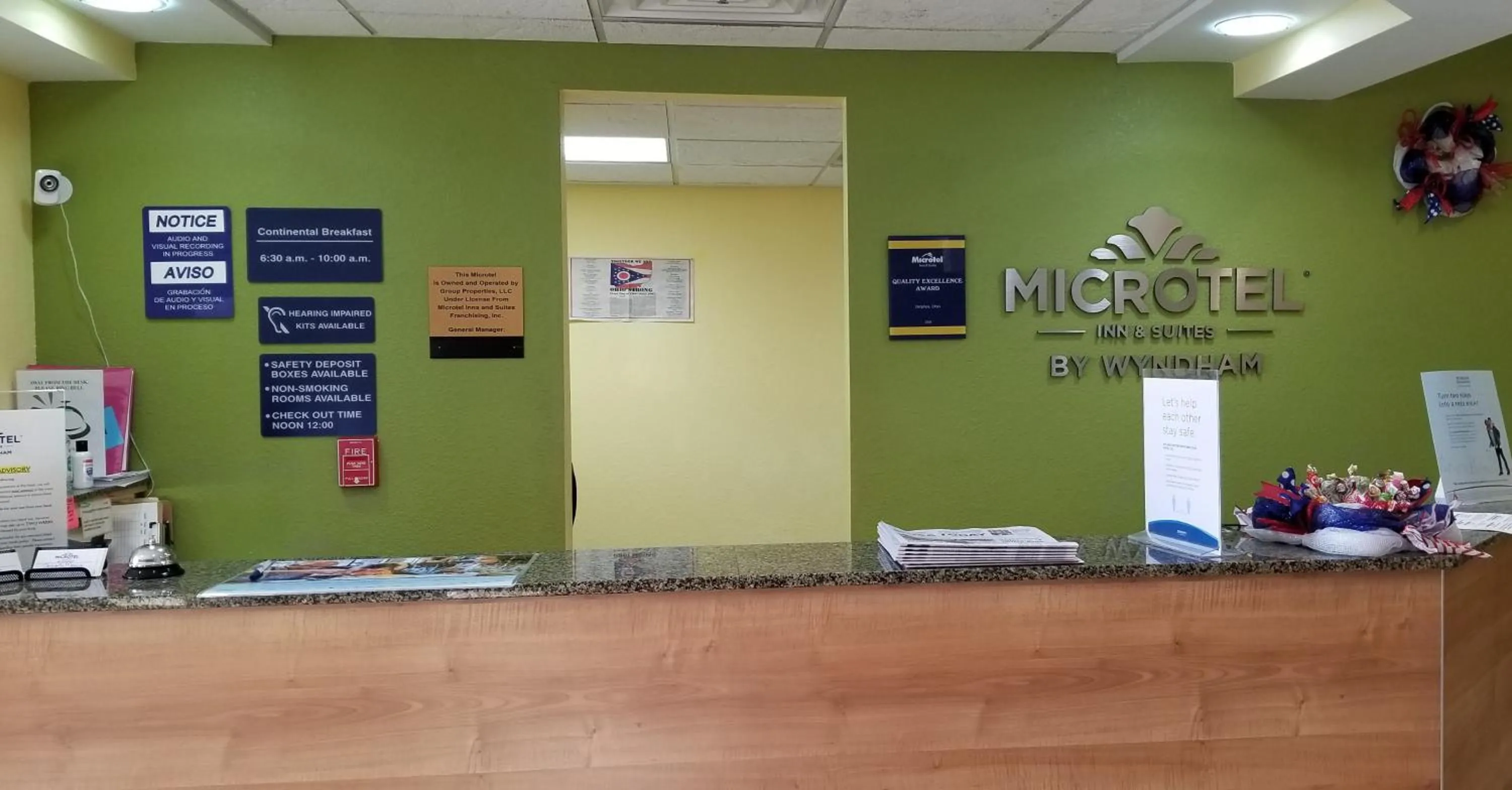 Property logo or sign in Microtel Inn & Suites by Wyndham Delphos