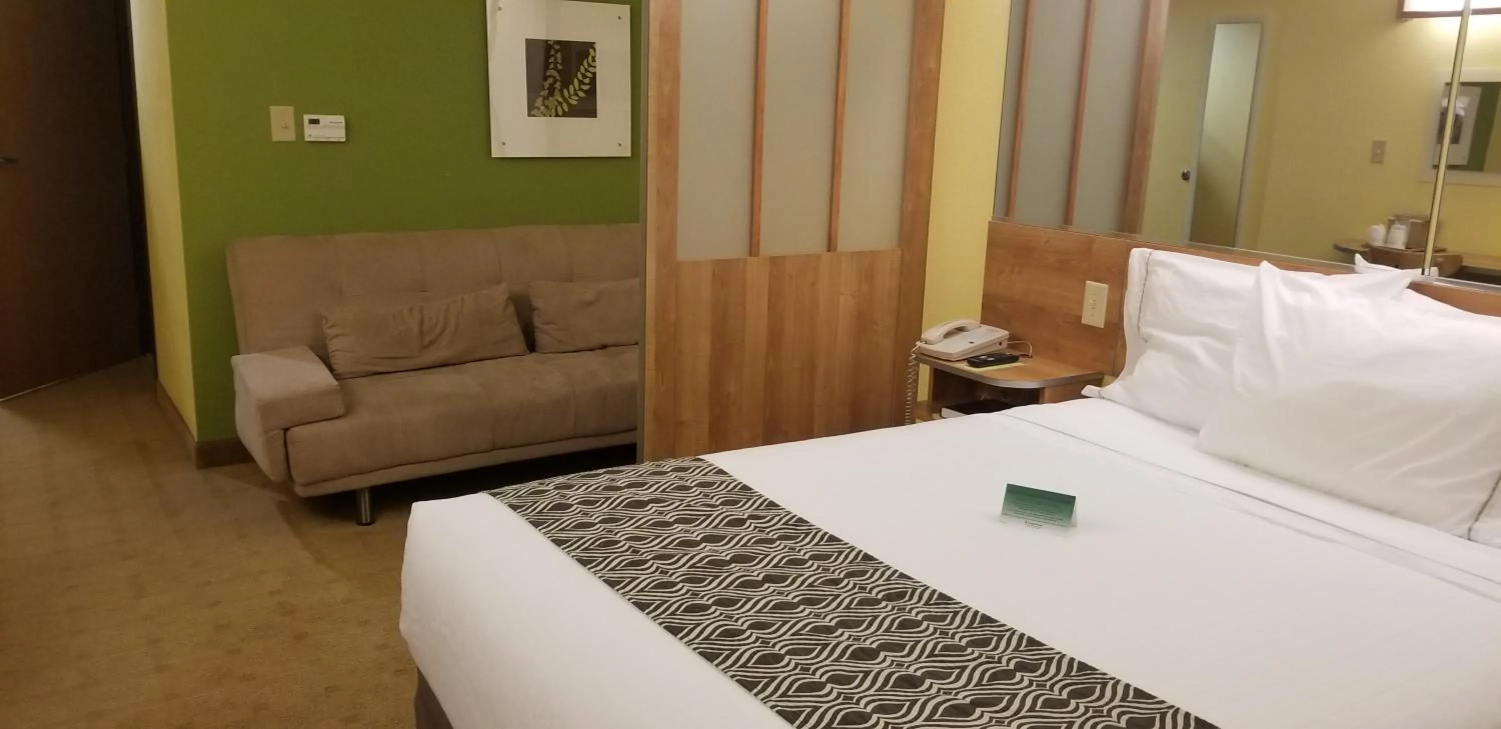 Photo of the whole room, Bed in Microtel Inn & Suites by Wyndham Delphos