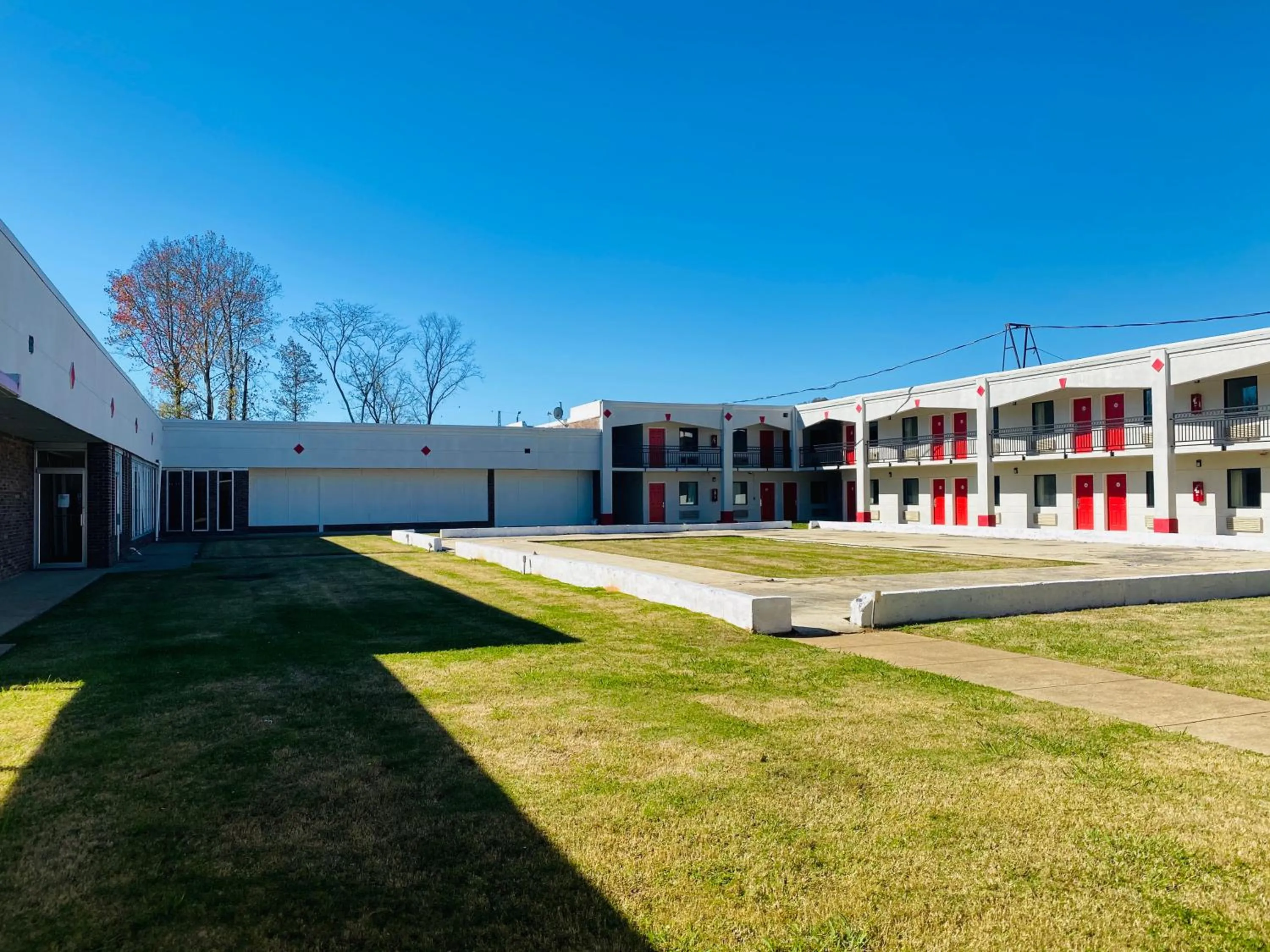 Property building in Traveler's Place Inn & Suites
