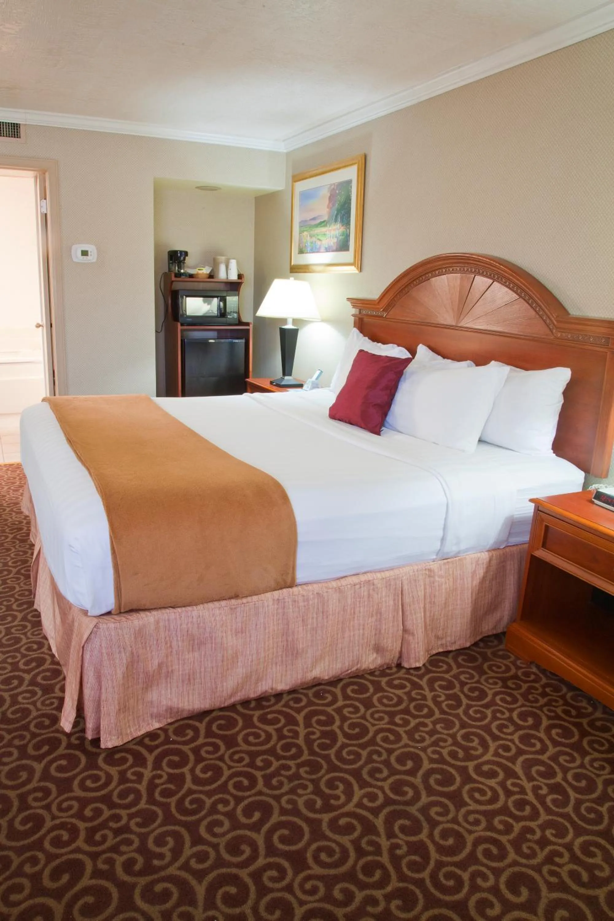 Bed in Red Arrow Inn & Suites, a Travelodge by Wyndham