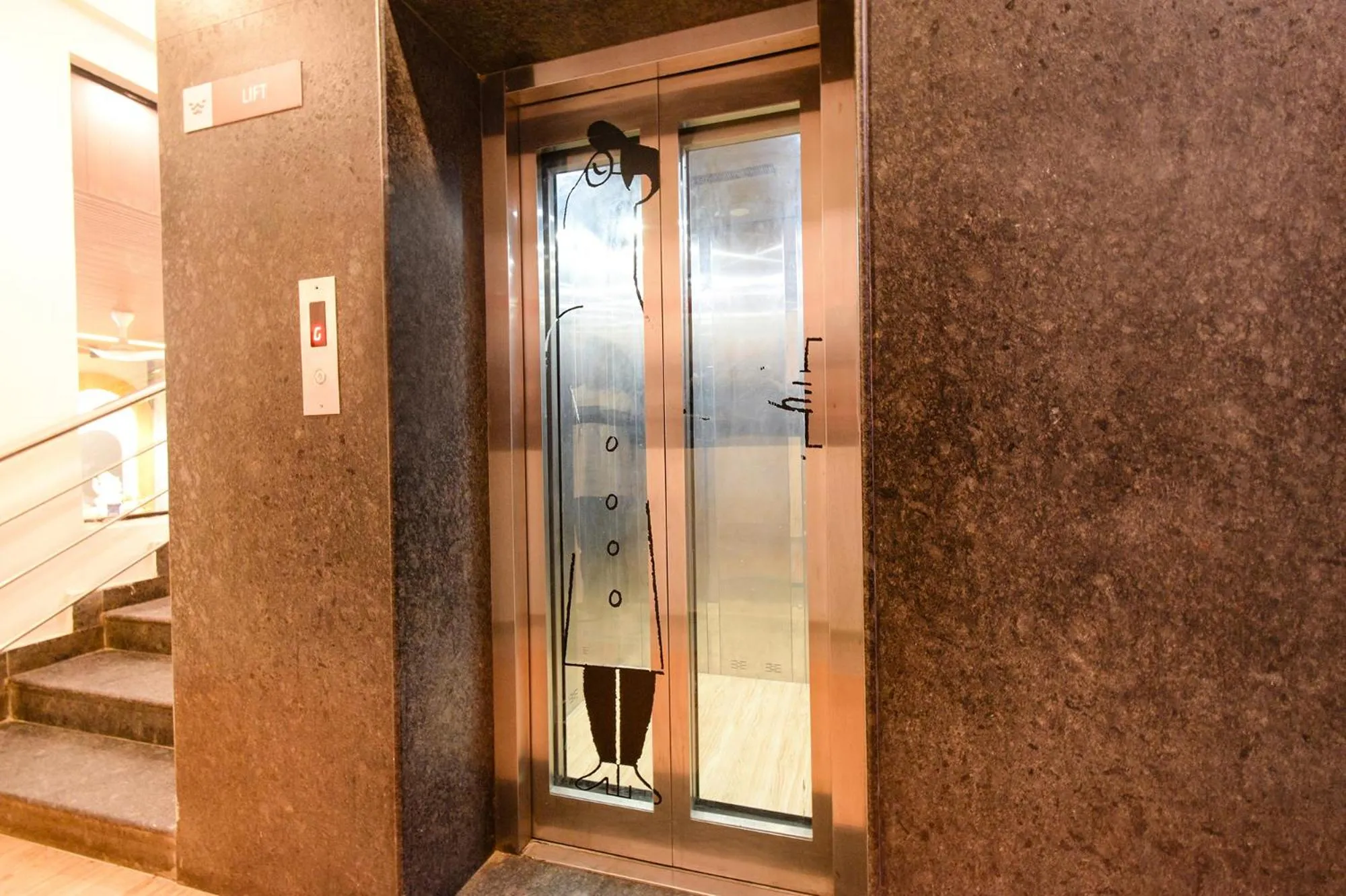 elevator in FabHotel White Ridge-SIa Life Hospital, Kondapur