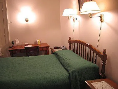 Bed in Olde Judge Mansion B&B