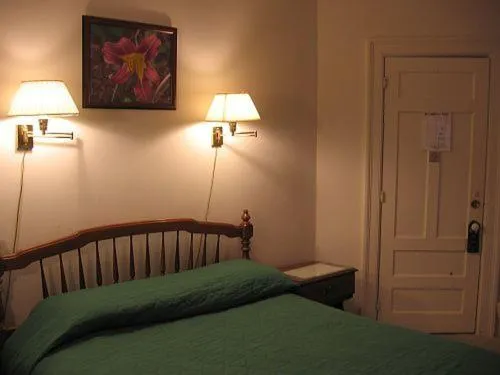 Bed in Olde Judge Mansion B&B