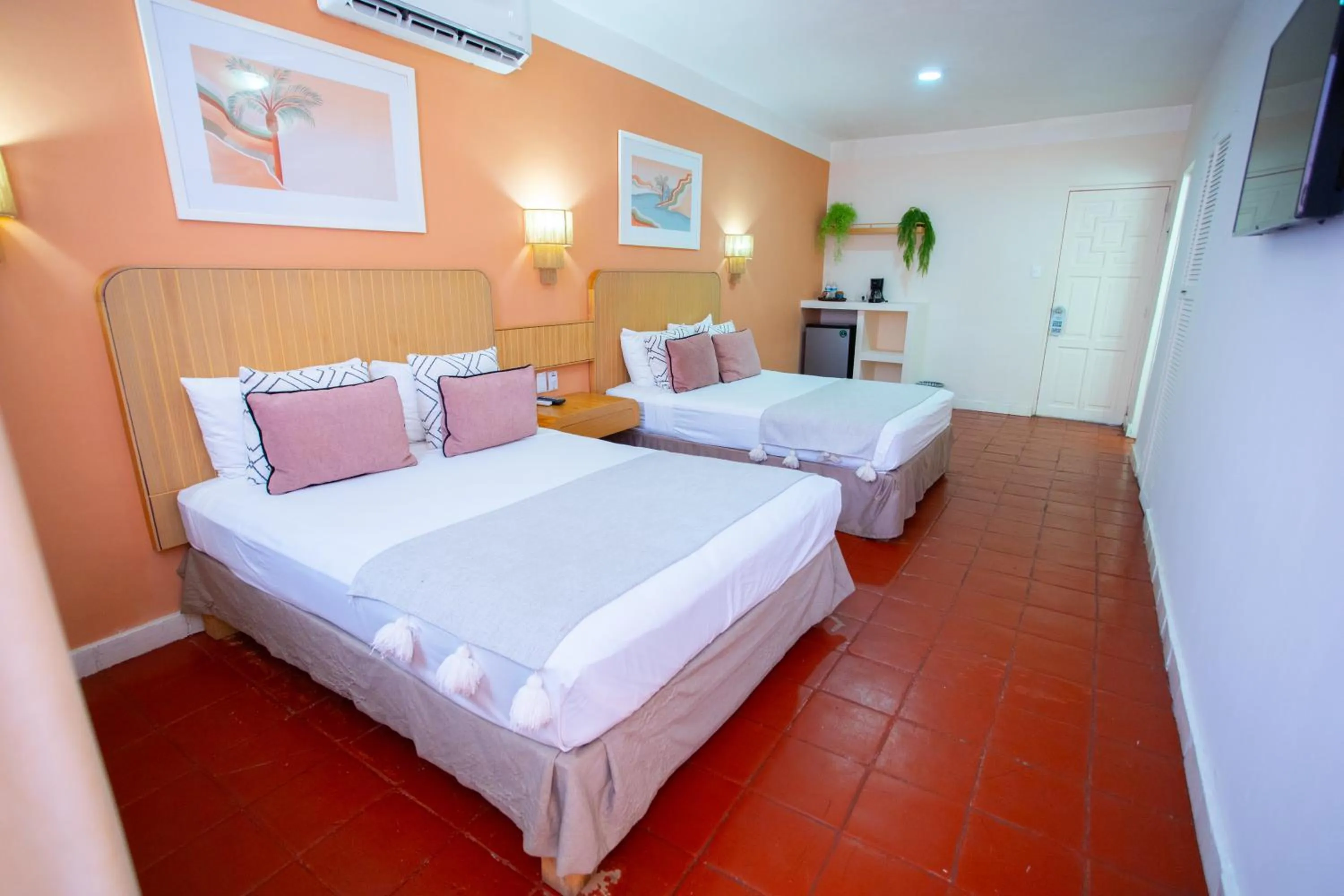 Bed in Hotel Tropicus Boutique