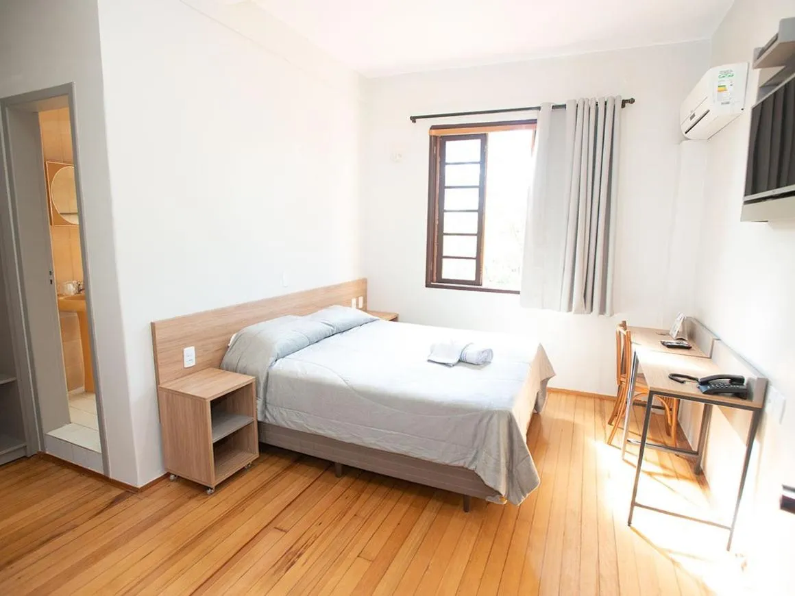 Bed in Hotel Dom Rafael Business