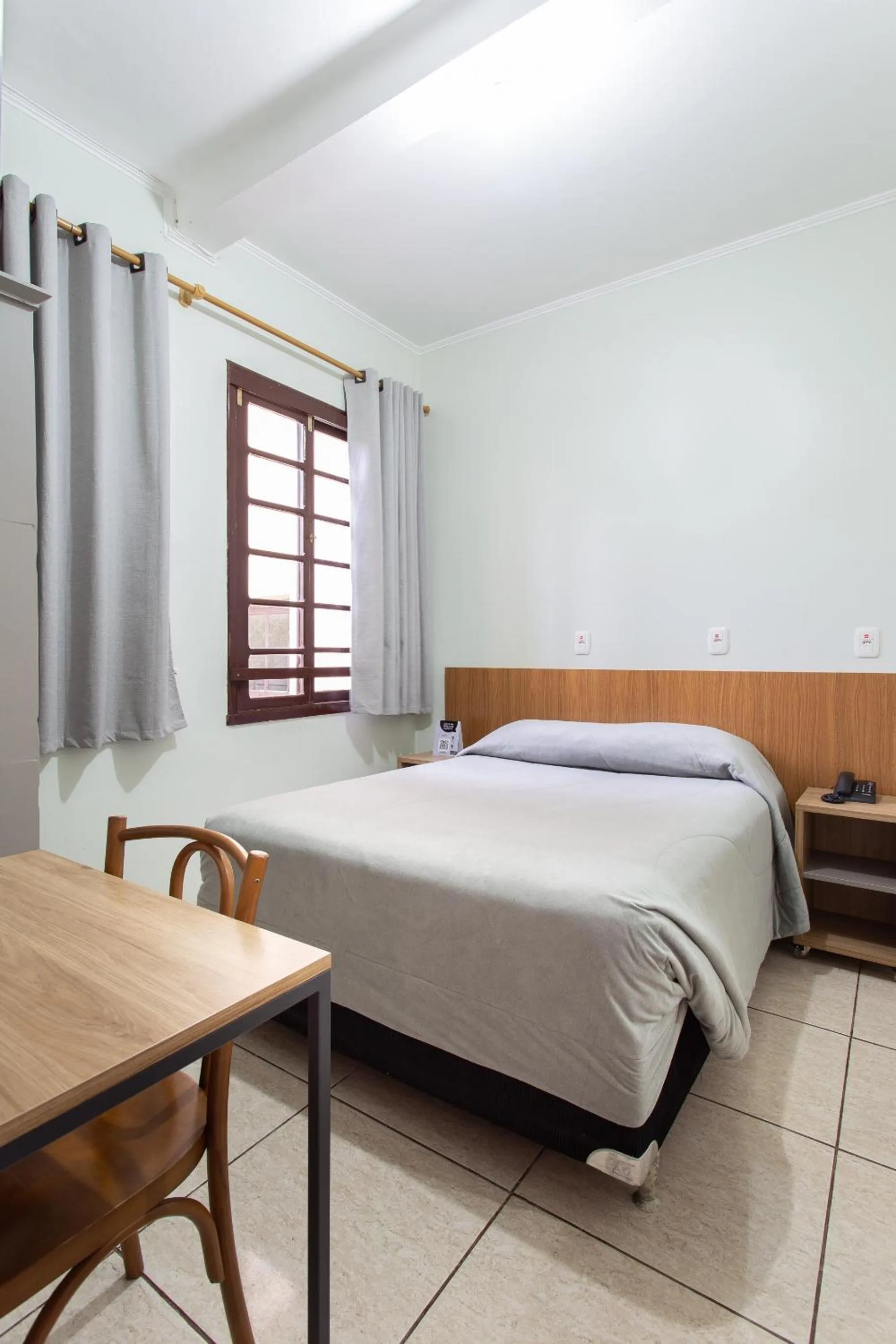 Bed in Hotel Dom Rafael Business