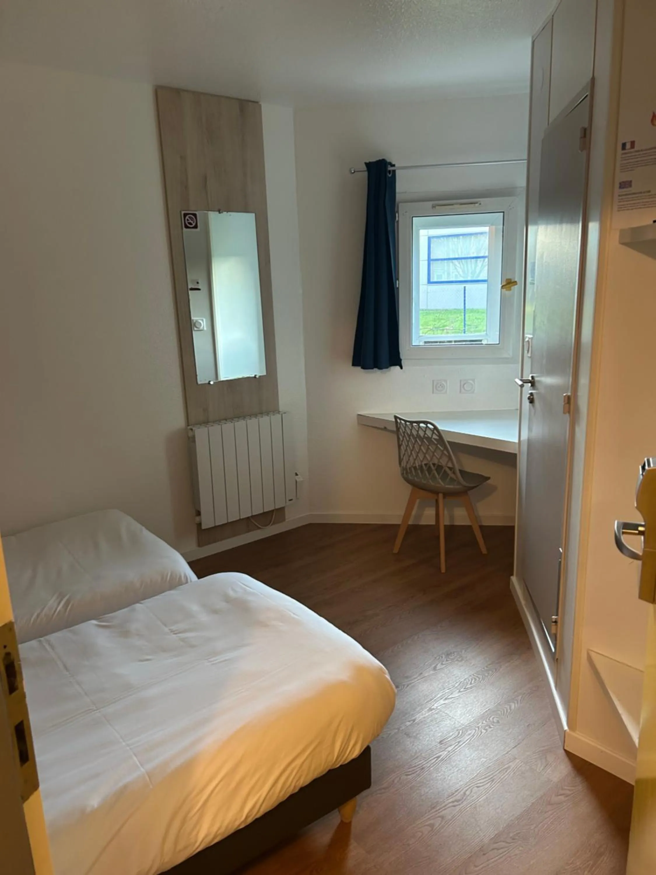 Bed in Kyriad Direct Macon Sud