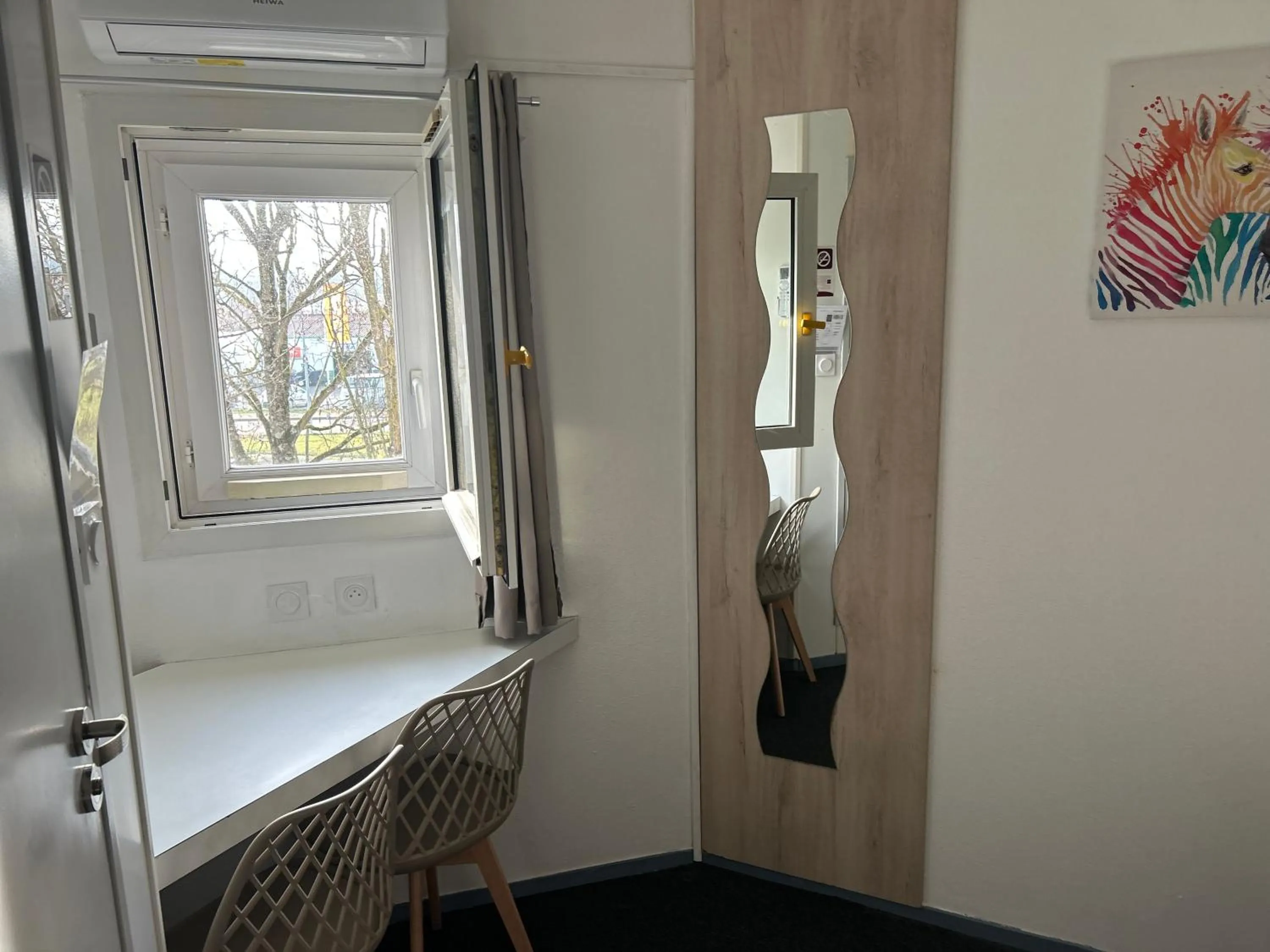 Bedroom in Kyriad Direct Macon Sud