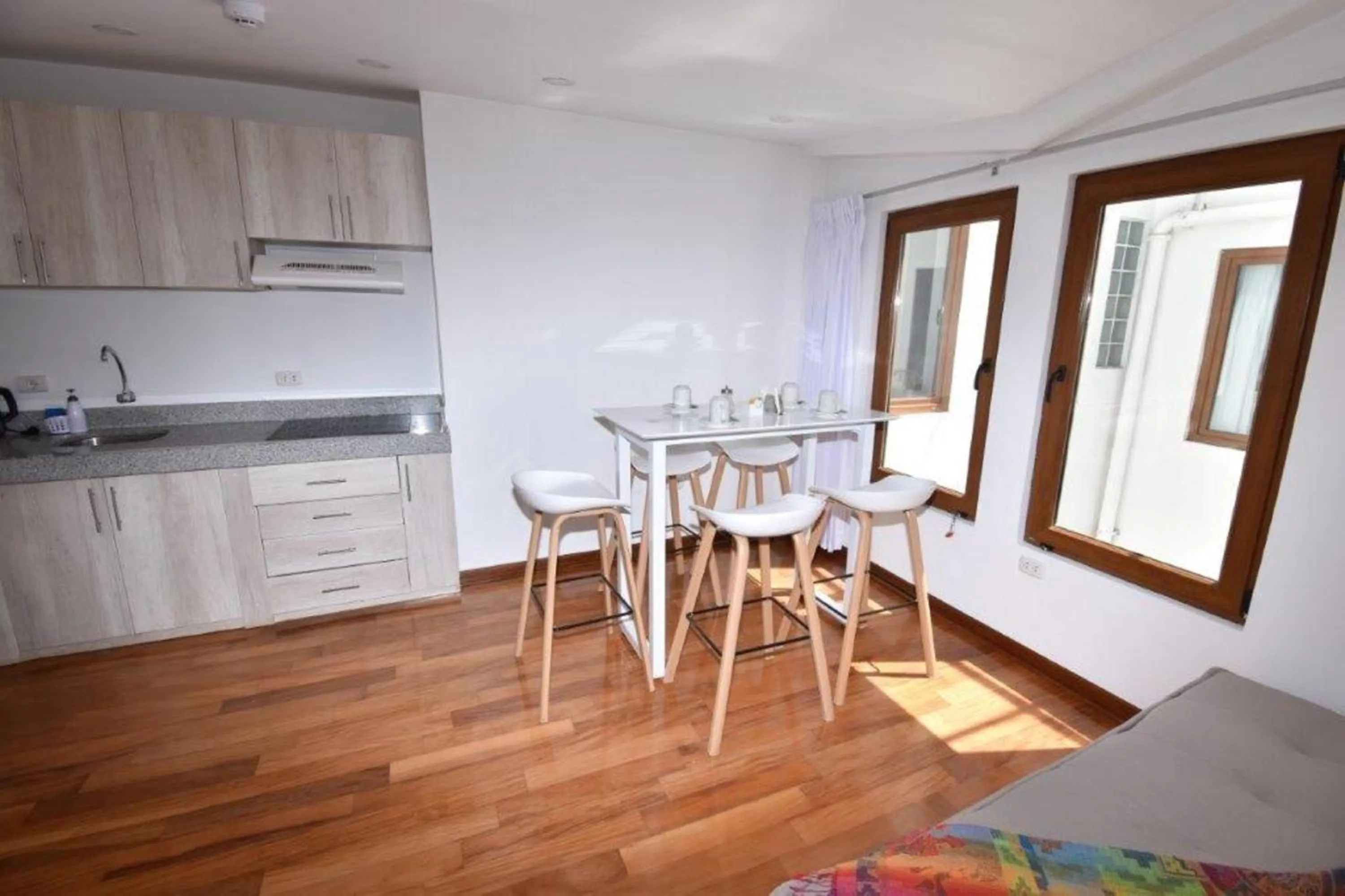 Dining area in Katari Apart Hotel at Qorikancha