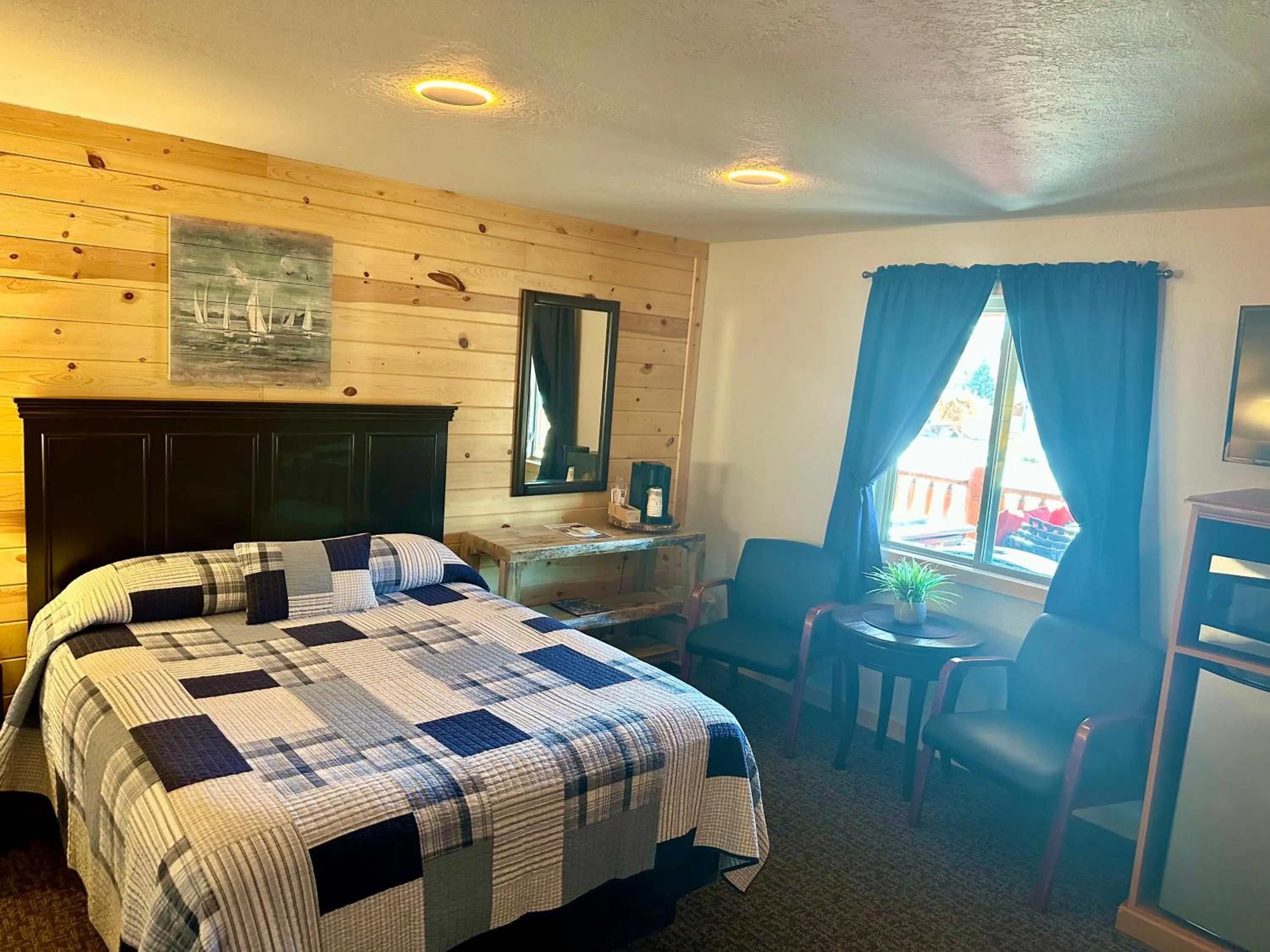 Bed in Mountain View Lodge & Cabins