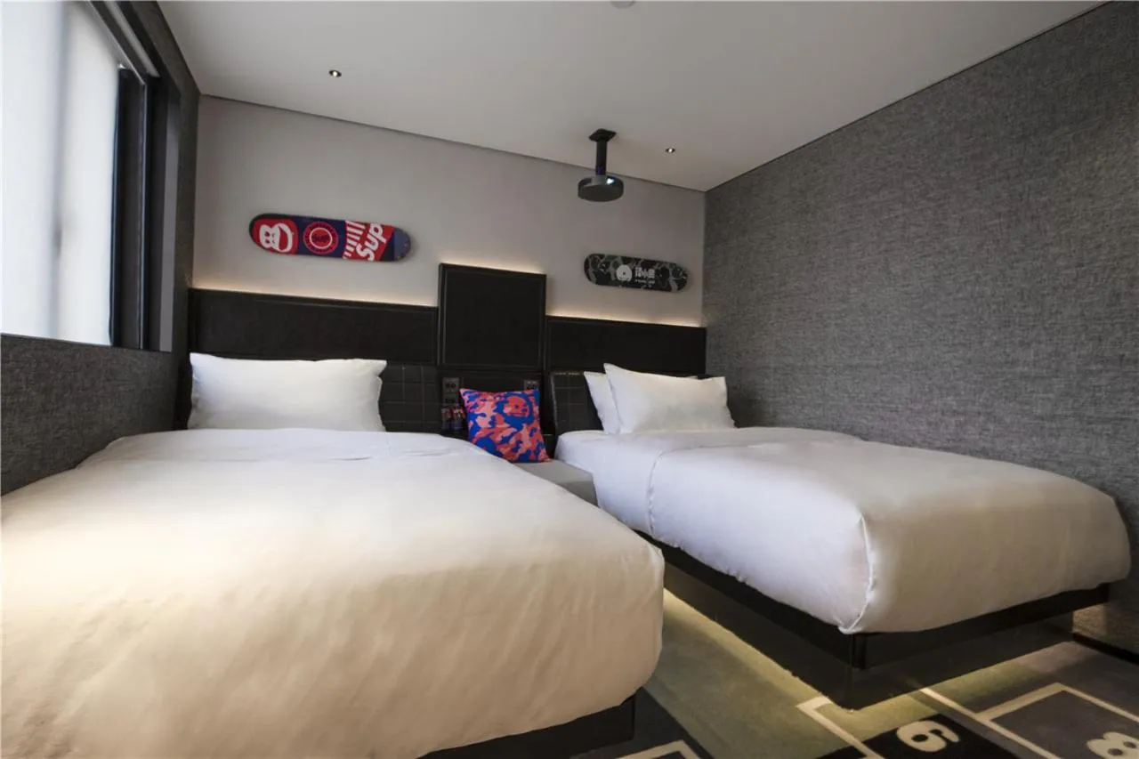 Bed in Fenk Attitude Hotel Guangzhou Railway Station