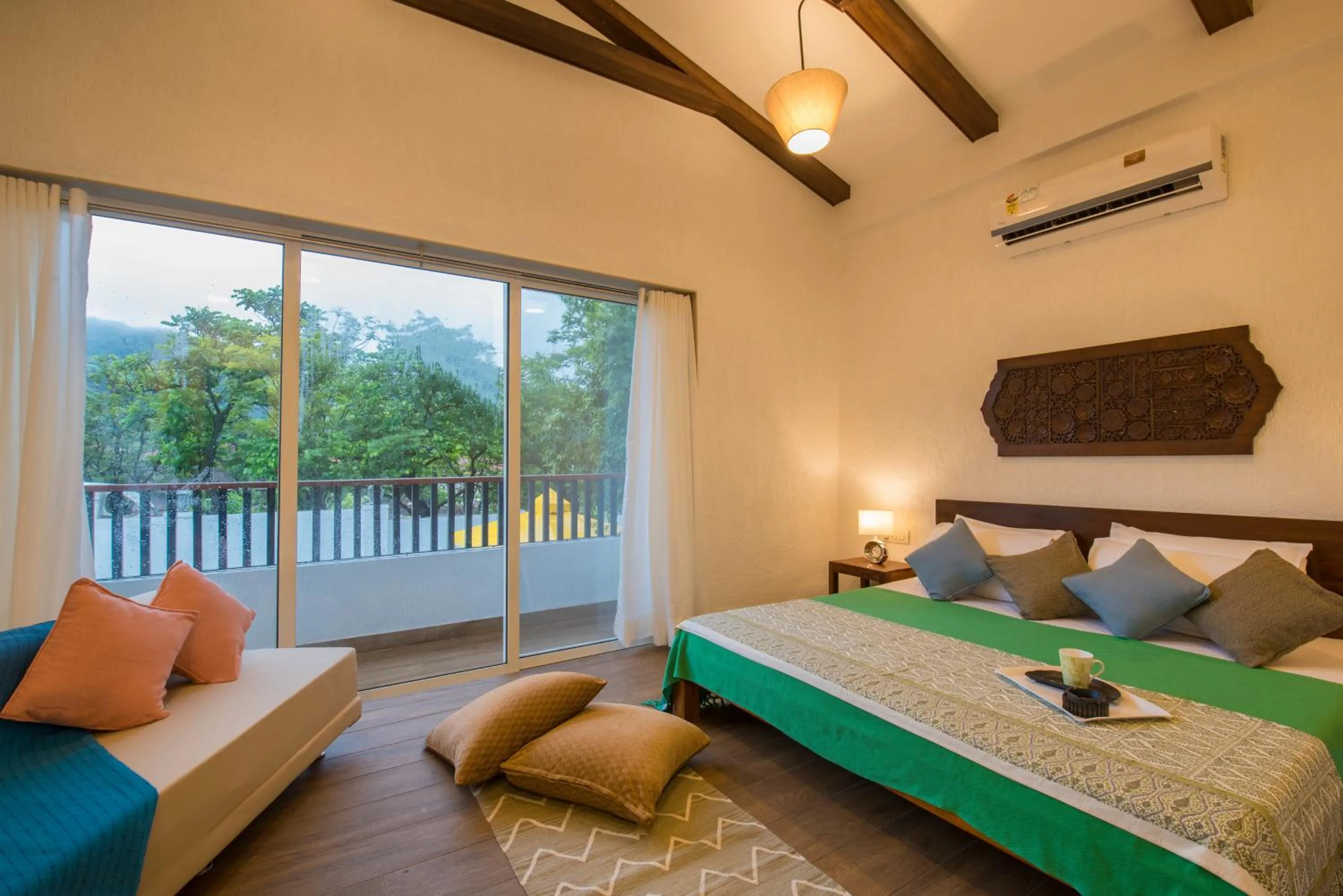 Bedroom, Bed in EL Lodge by StayVista - Pool, lawn, and a charming gazebo for your perfect getaway