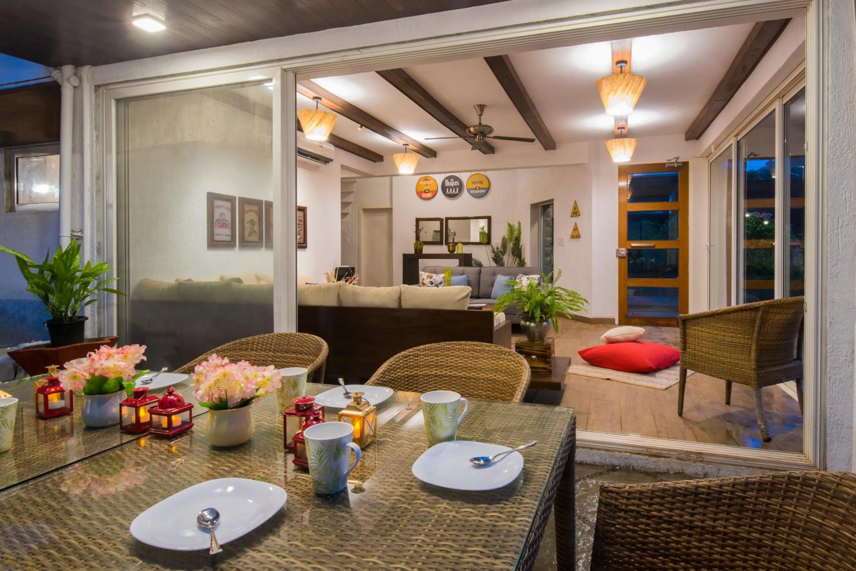 Dining area in EL Lodge by StayVista - Pool, lawn, and a charming gazebo for your perfect getaway