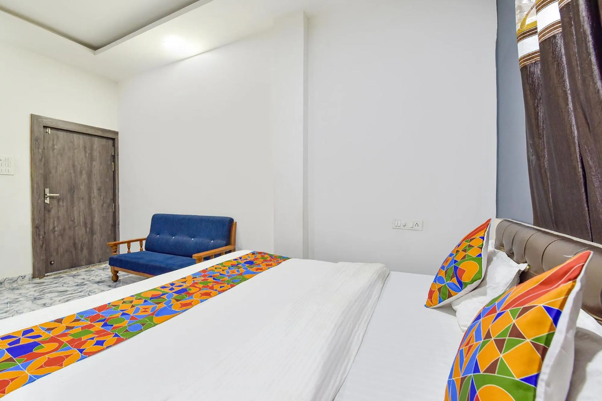 Bed in FabHotel Soni Palace