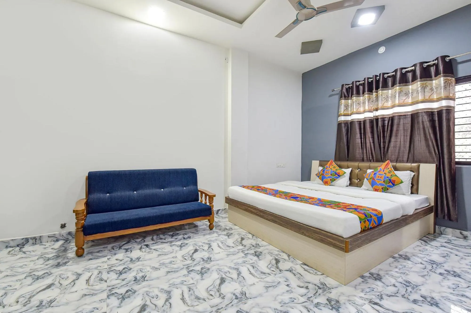 Bed in FabHotel Soni Palace