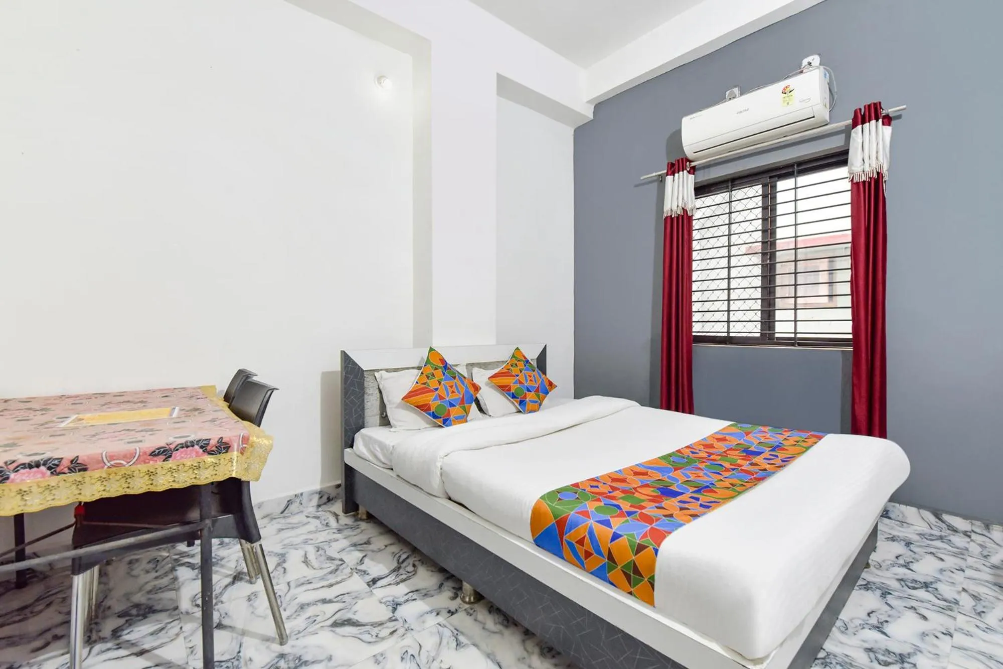 Bed in FabHotel Soni Palace