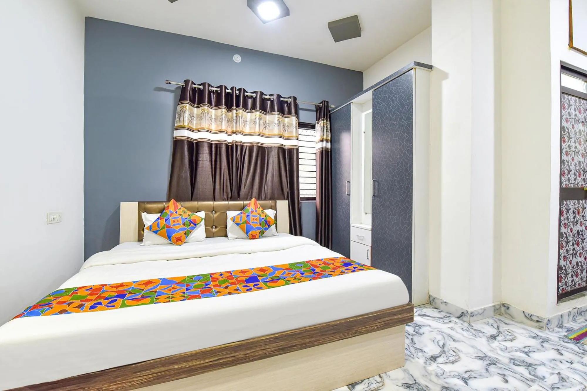 Bed in FabHotel Soni Palace