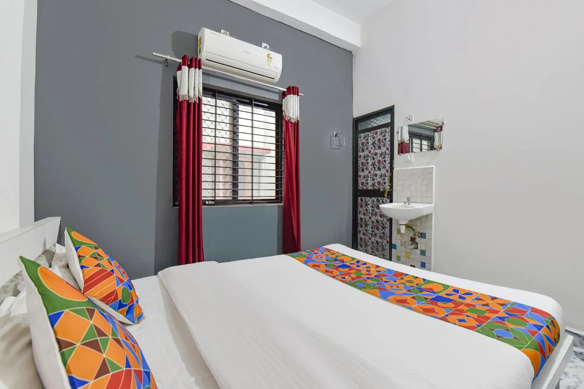 Bed in FabHotel Soni Palace