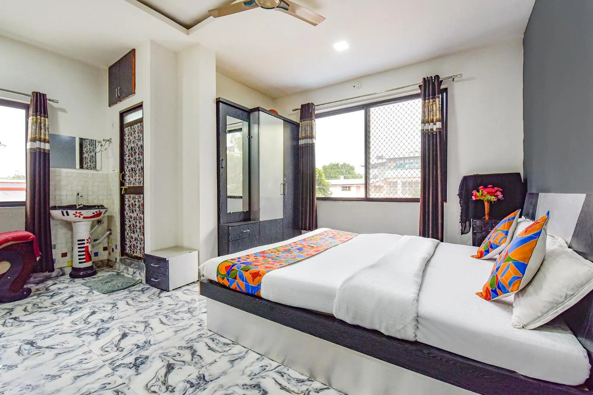 Bed in FabHotel Soni Palace