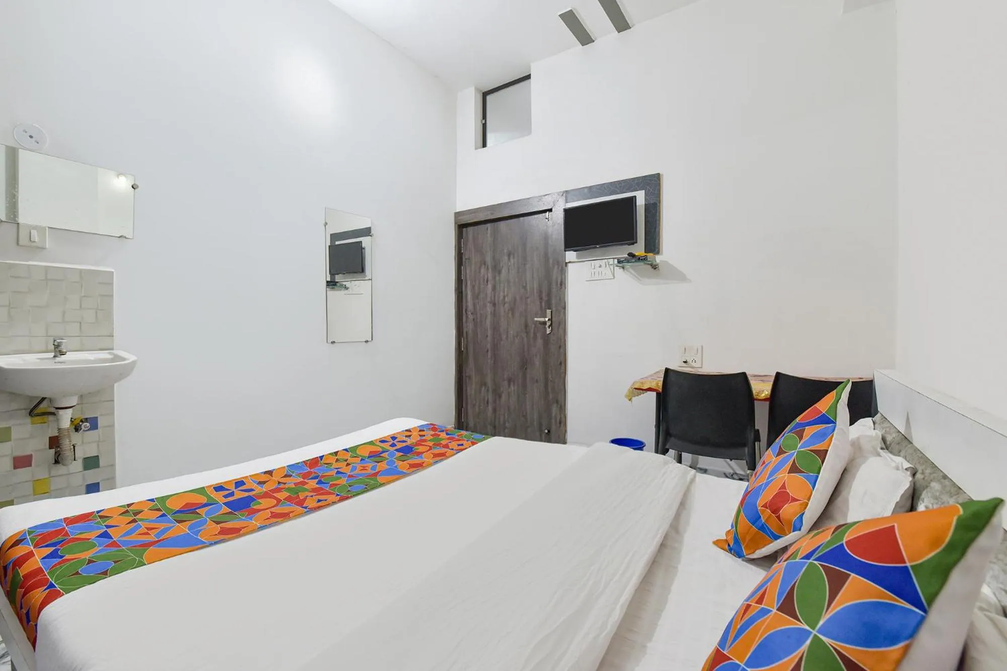 Bed in FabHotel Soni Palace