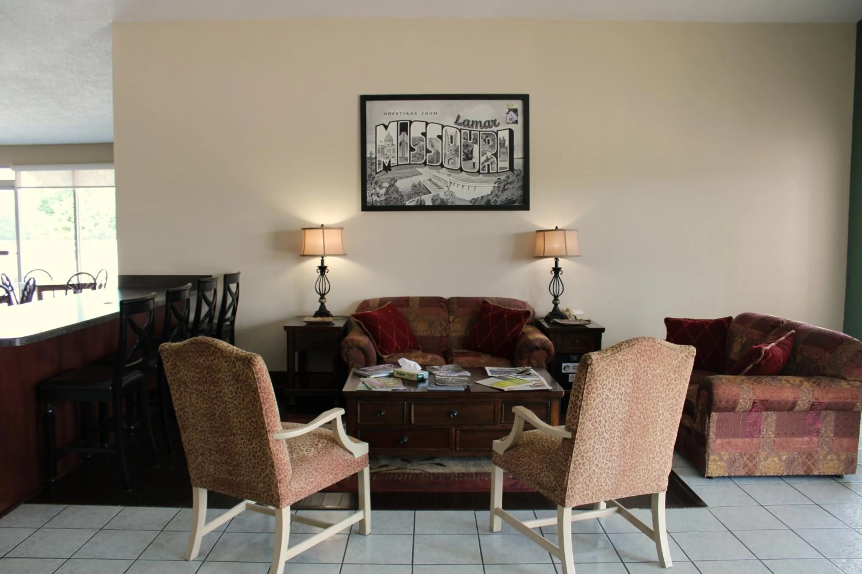 Seating area in Boarders Inn and Suites by Cobblestone Lamar Missouri
