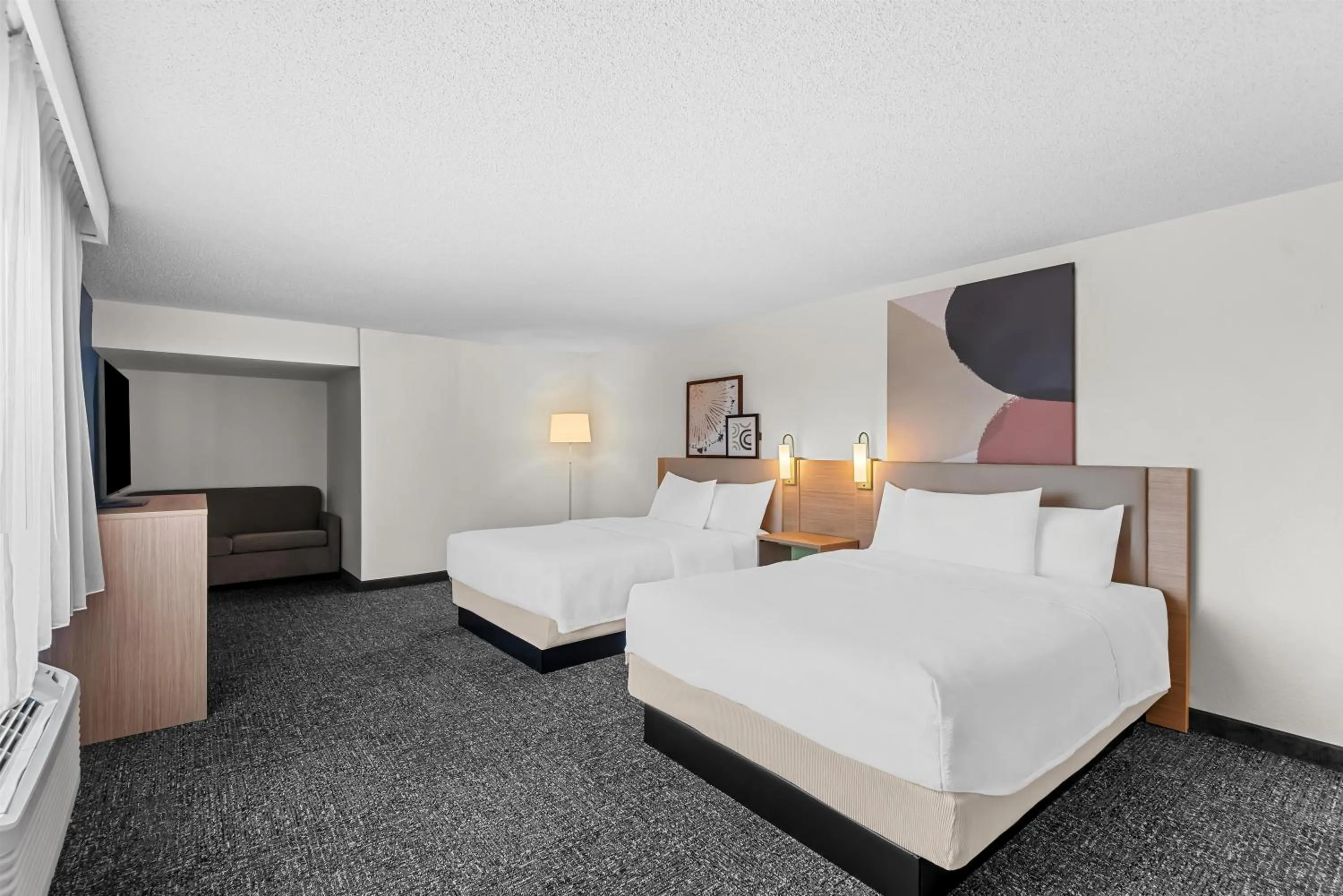 Living room, Bed in Spark by Hilton Cedar Falls