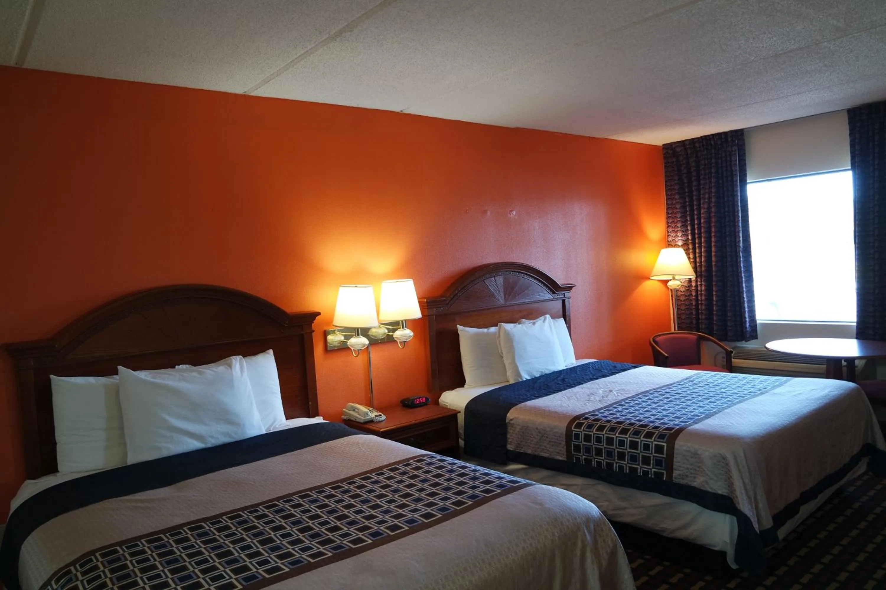 Bed in Howard Johnson by Wyndham Perry GA