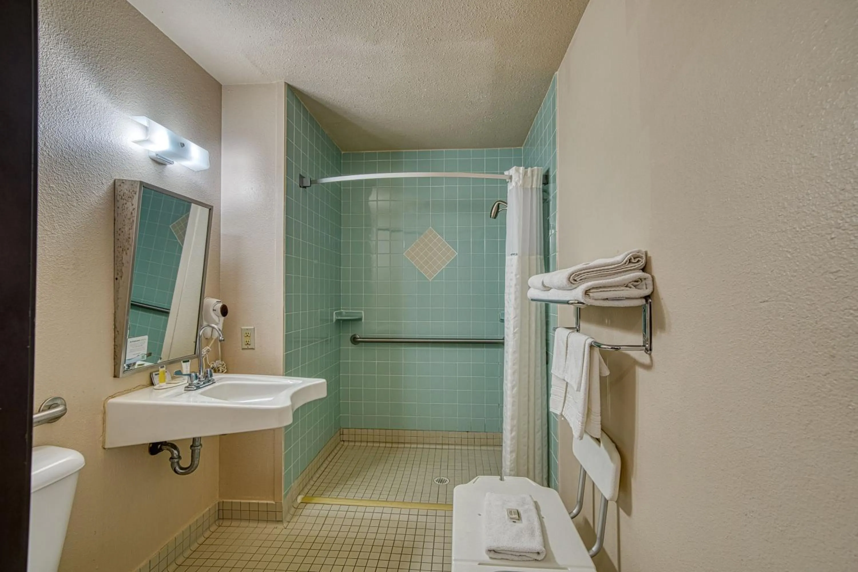 Bathroom in Super 8 by Wyndham Sturgis