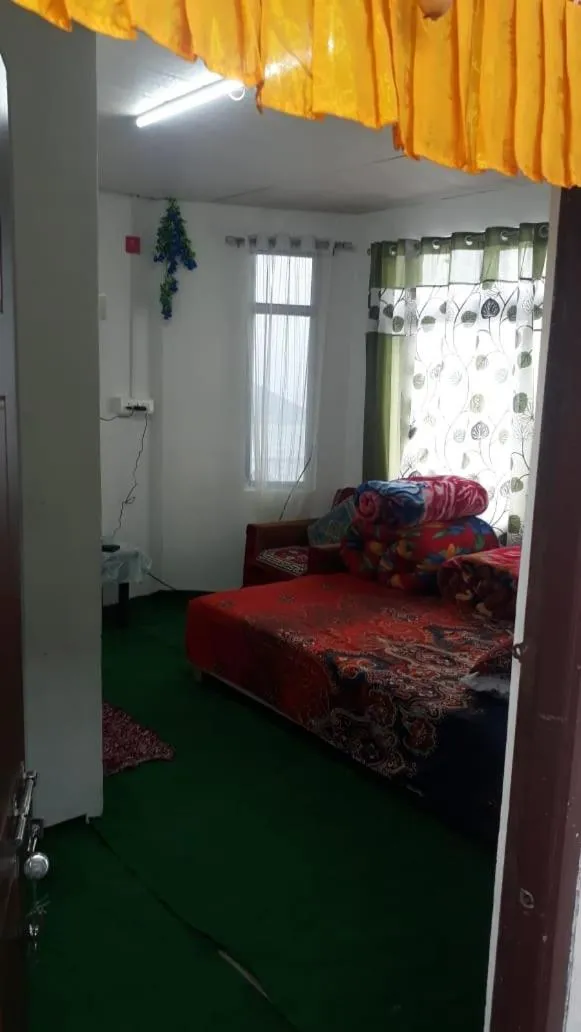 Photo of the whole room, Bed in Laliguras Homestay