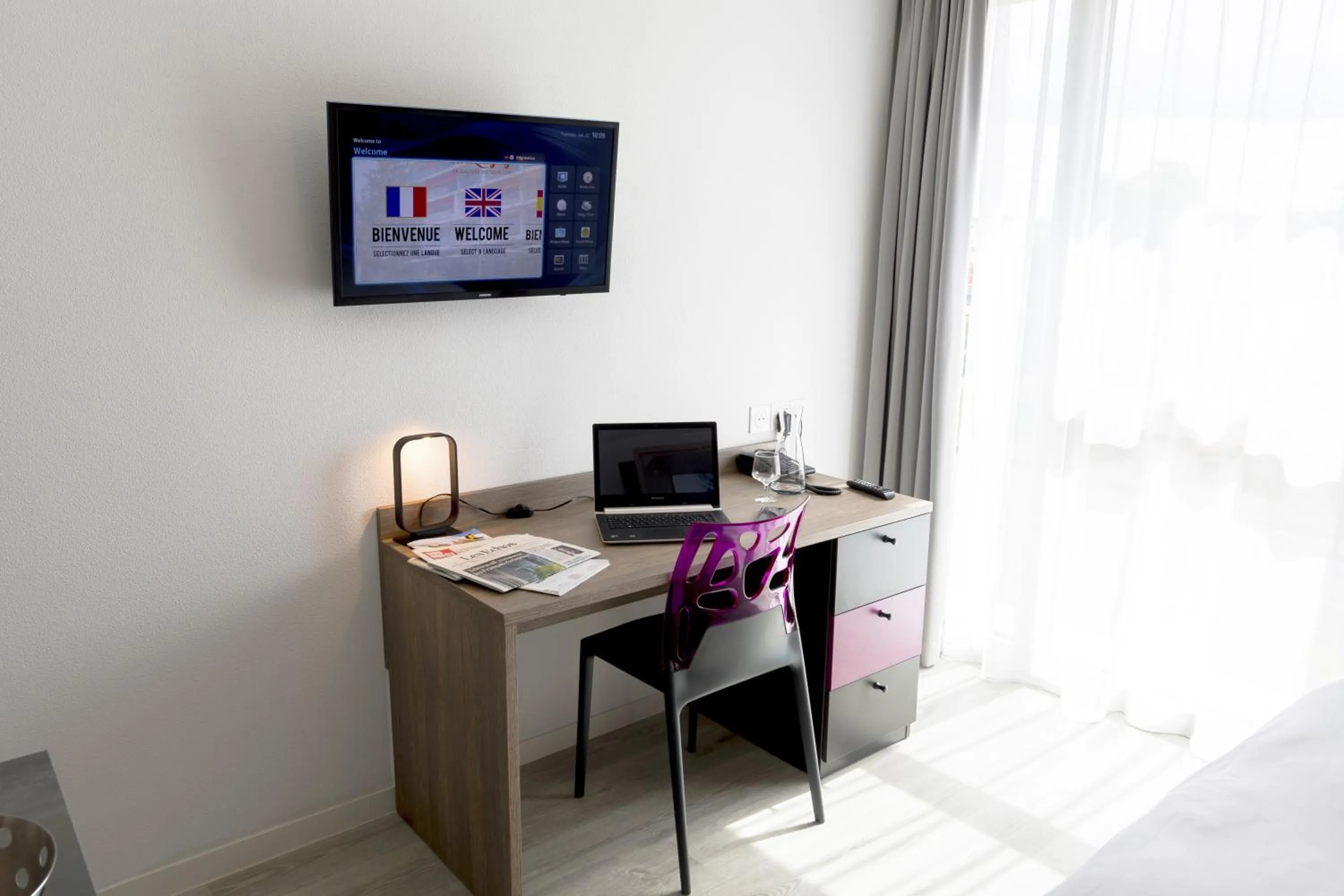 TV and multimedia in Appart-Hôtel Mer & Golf City Bordeaux Lac