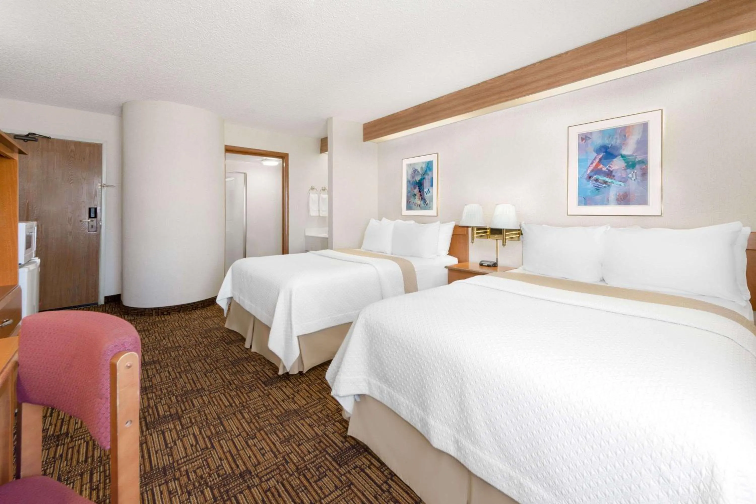 Photo of the whole room, Bed in Days Inn by Wyndham Liberal KS