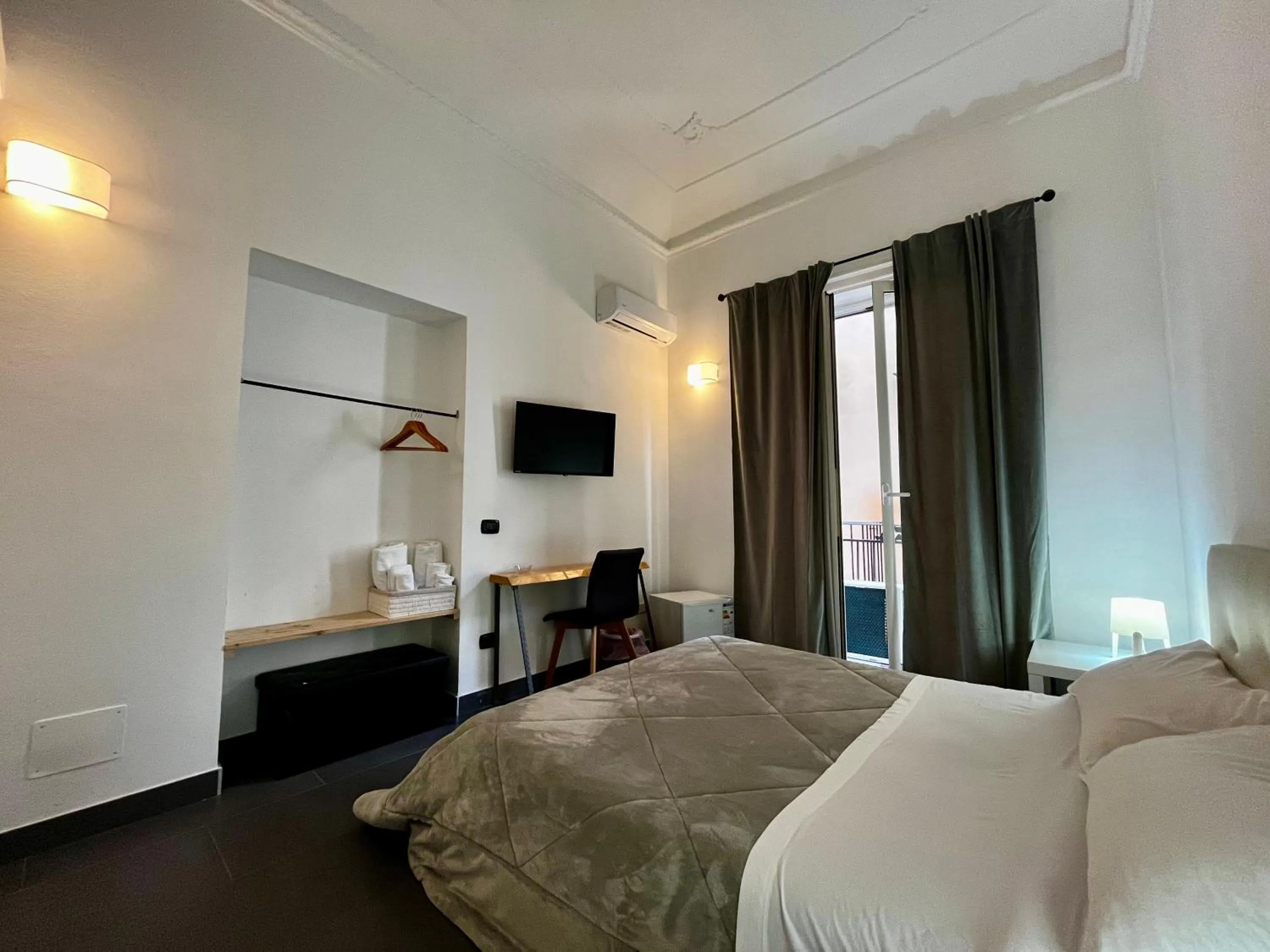 TV and multimedia, Bed in Pupi 93 Rooms