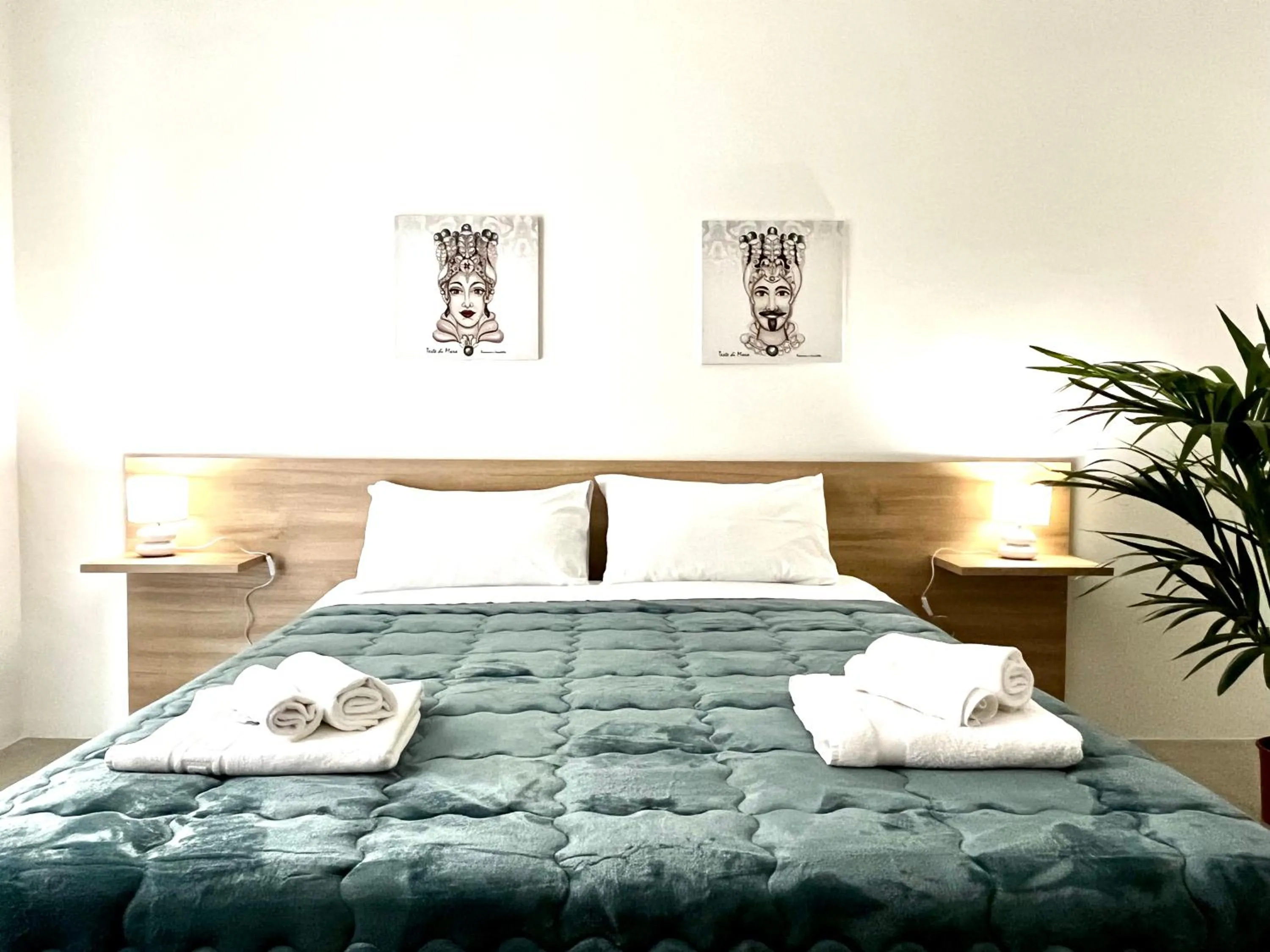 Bed in Pupi 93 Rooms