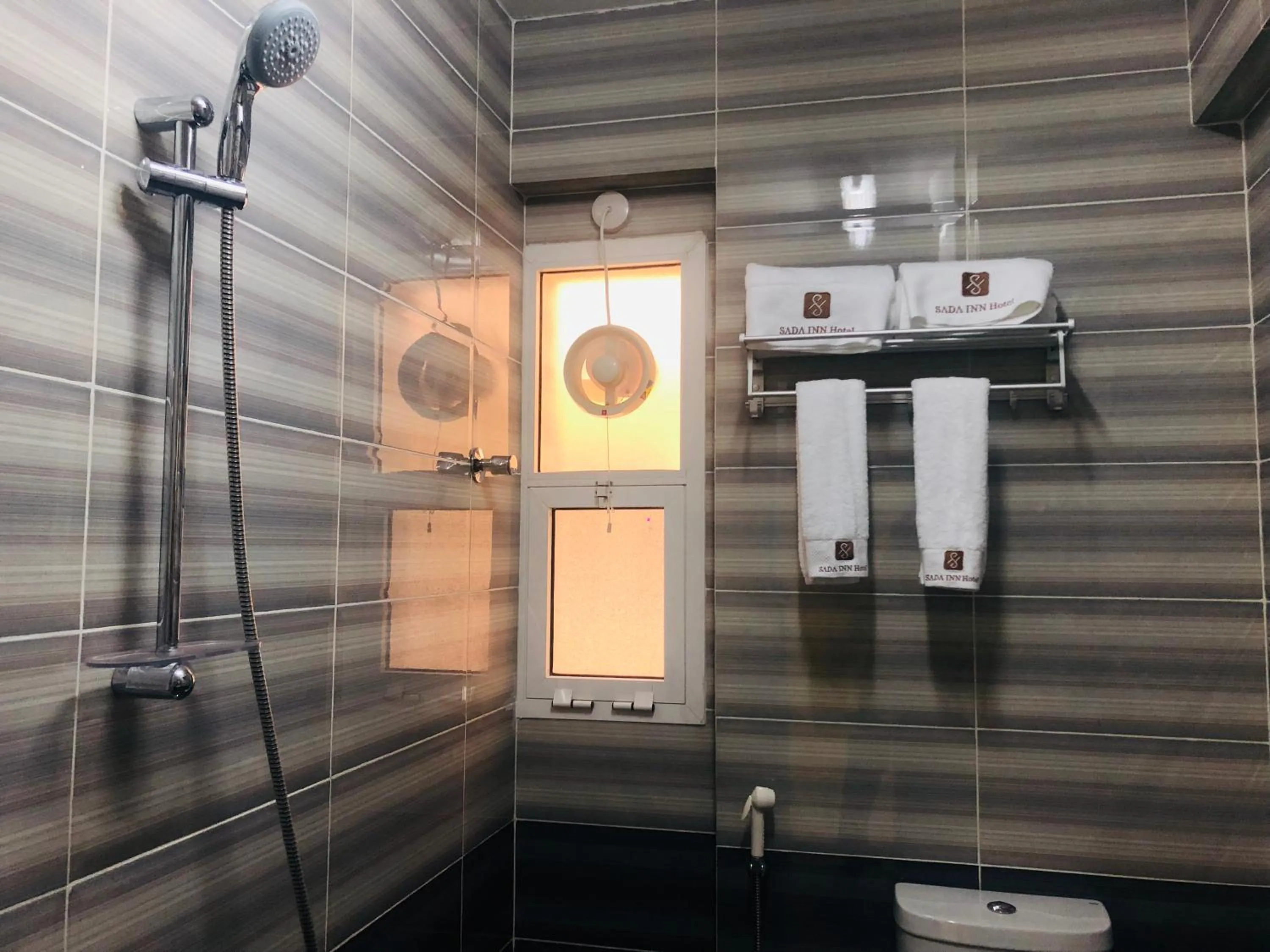 Bathroom in Season Inn Hotel