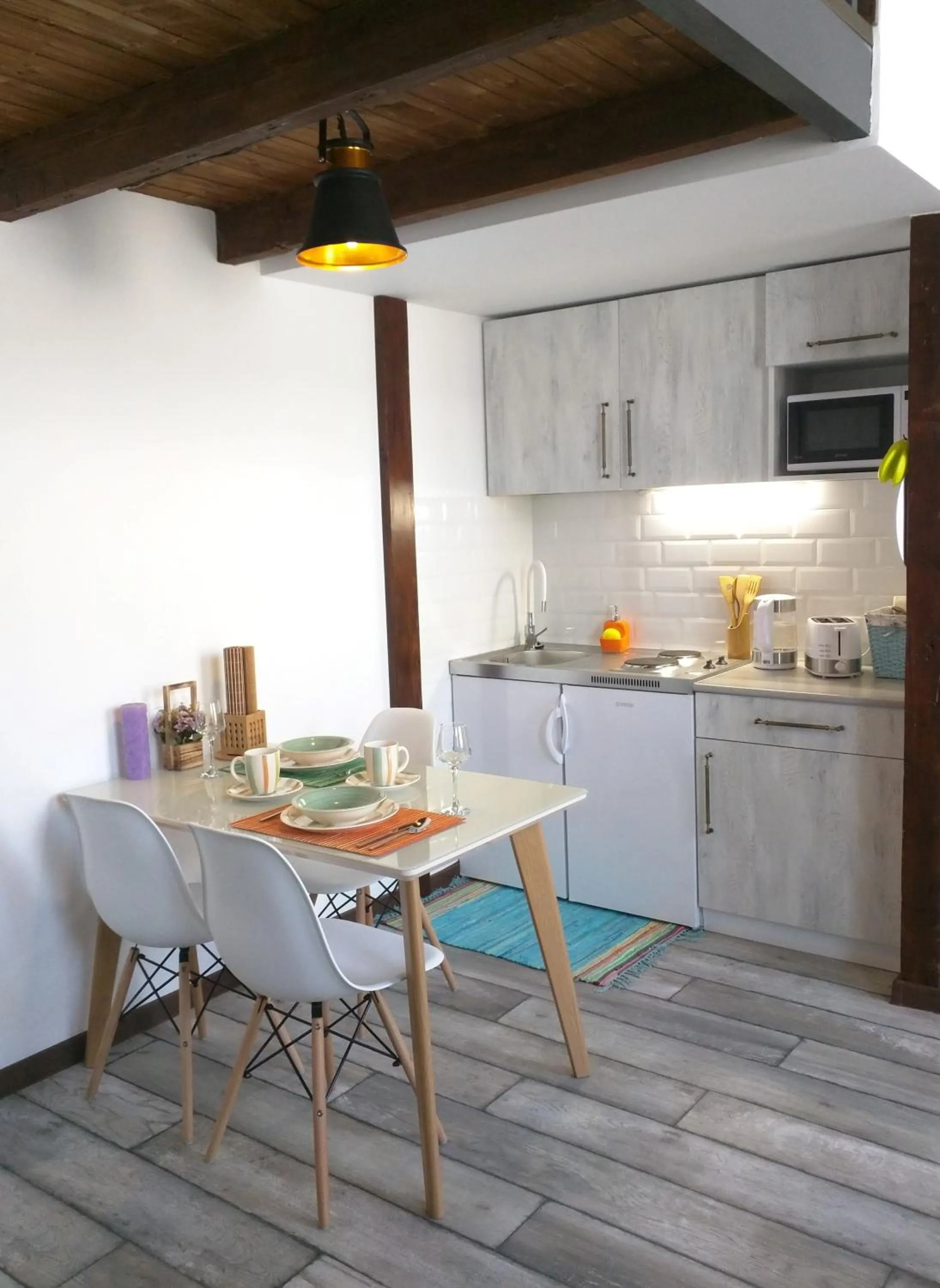 Kitchen or kitchenette in Cozy Studios on Freedom Square