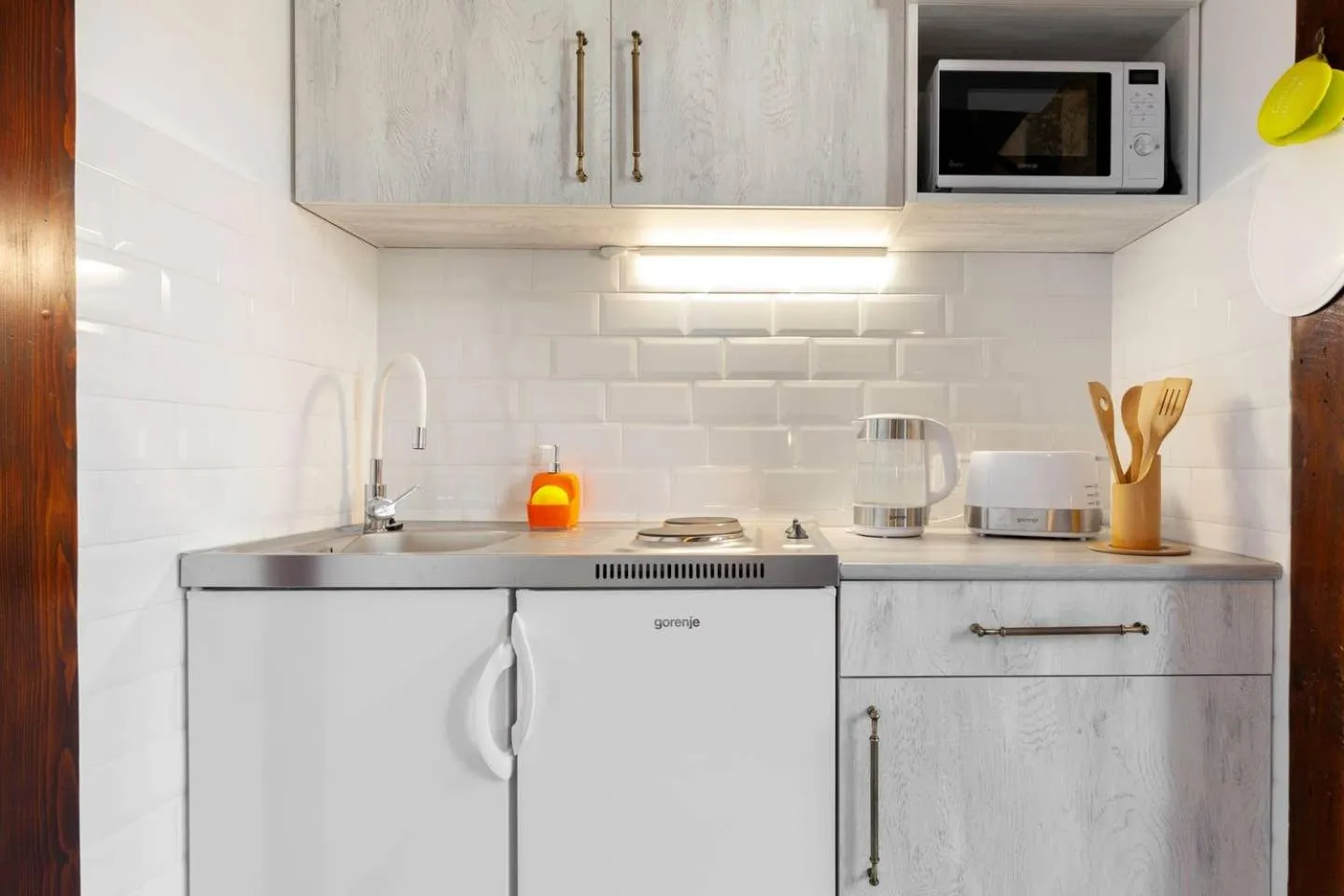 Kitchen or kitchenette in Cozy Studios on Freedom Square