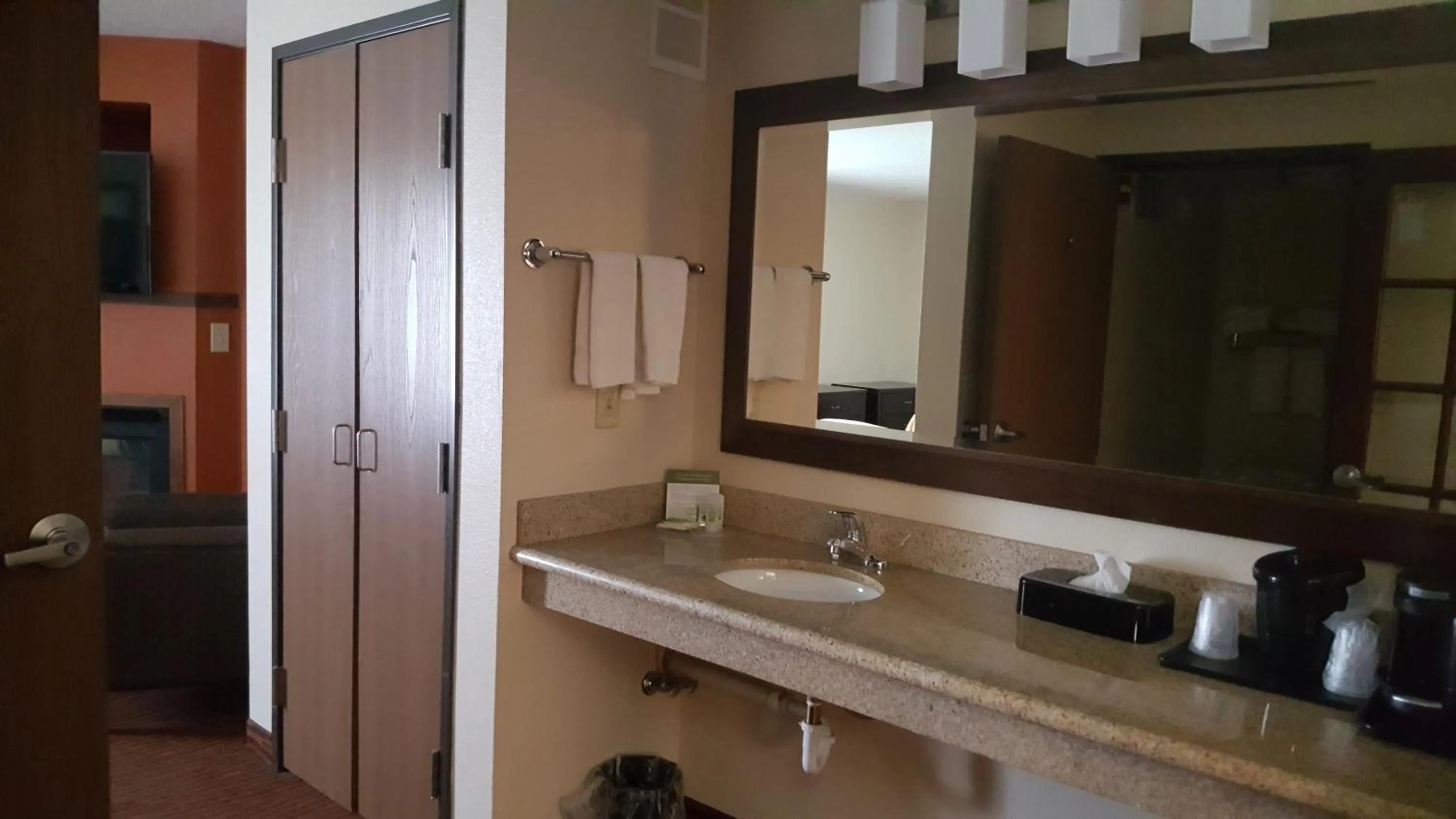 Bathroom in AmericInn by Wyndham Muscatine