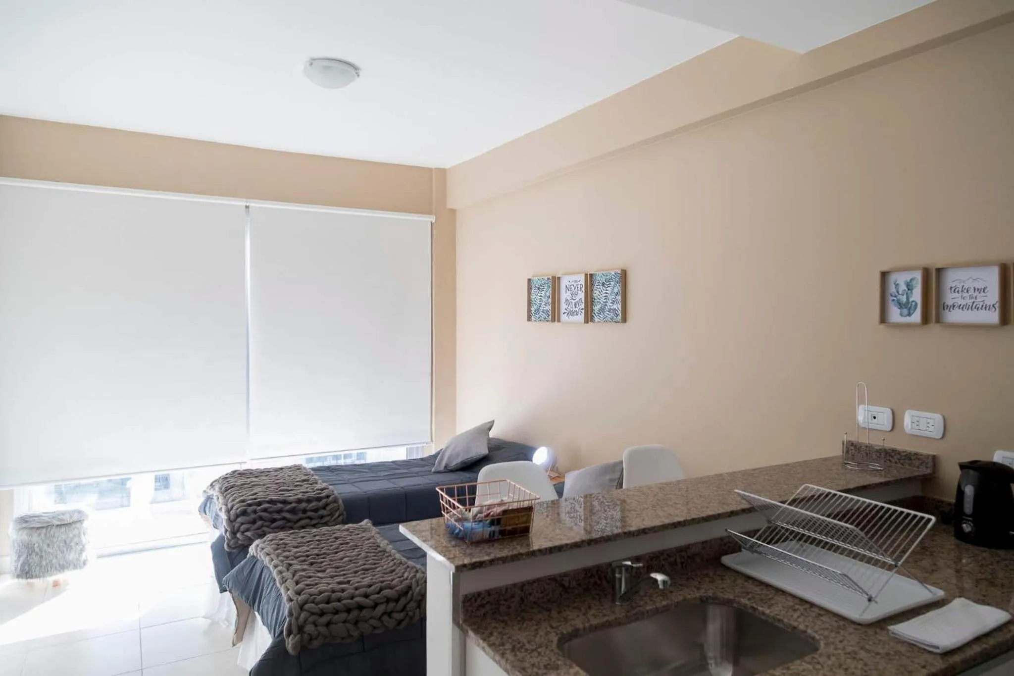 Photo of the whole room in DEL SOL Apartamentos Salta