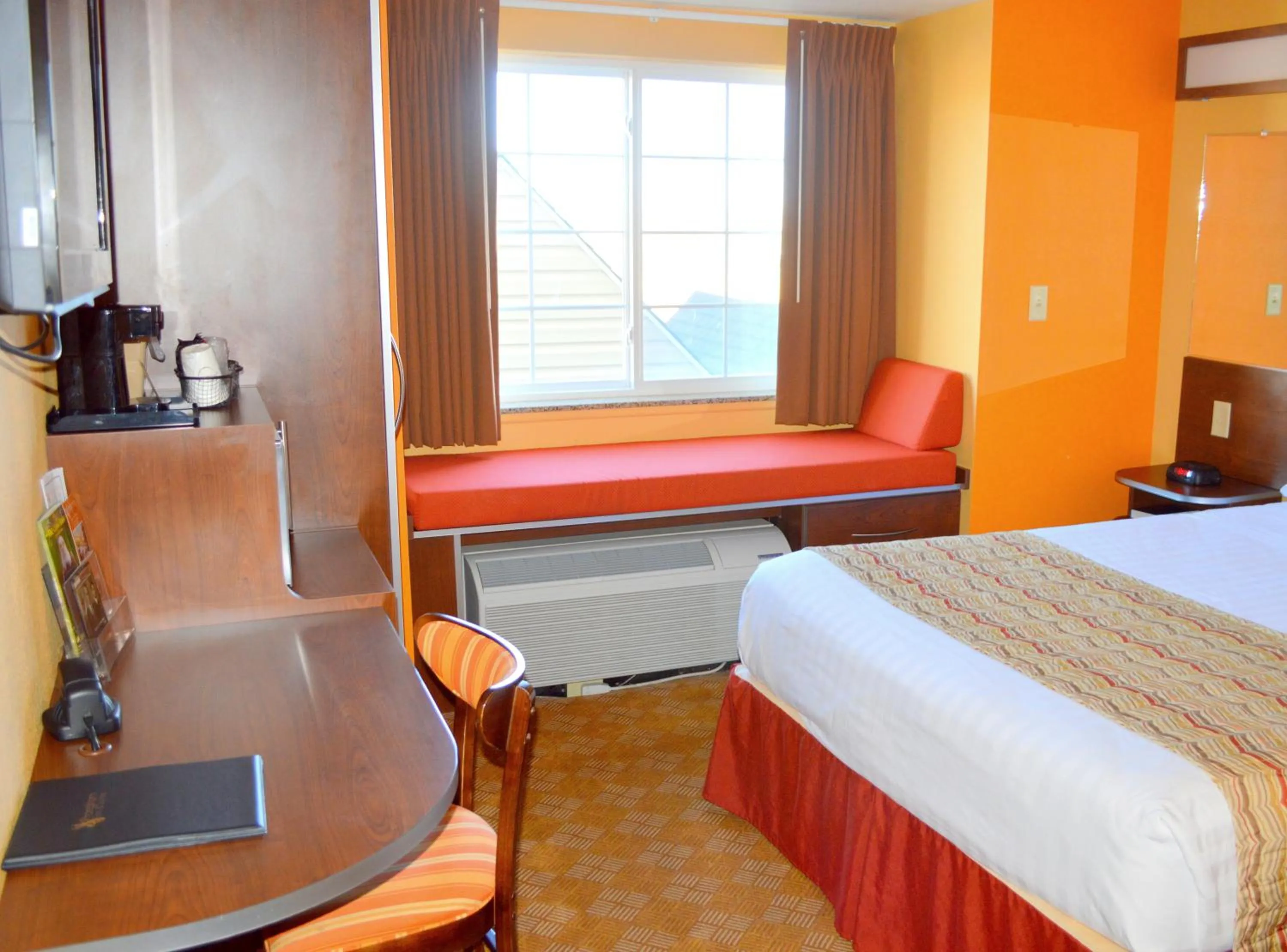 Bed in Microtel Inn and Suites by Wyndham Rawlins