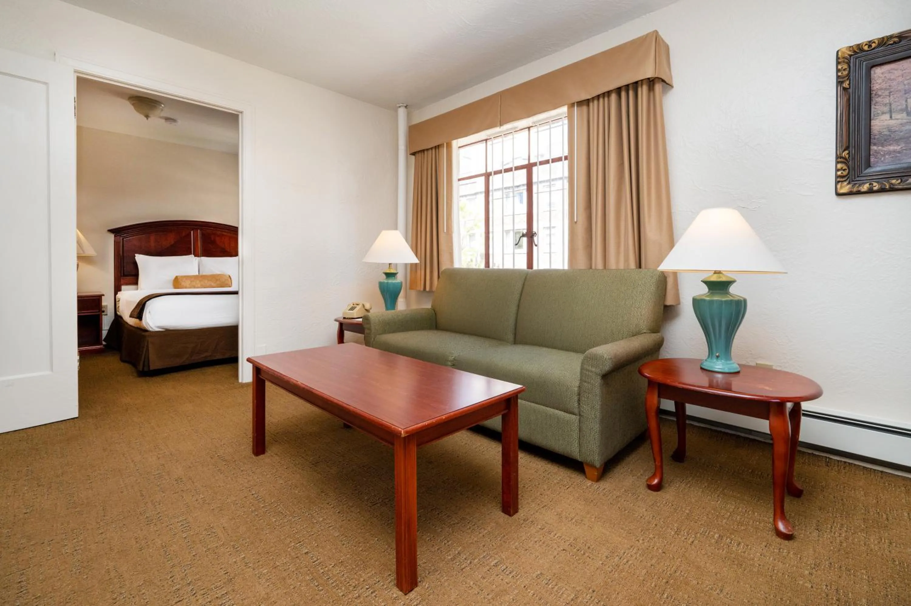 Living room, Bed in The Baroness Hotel