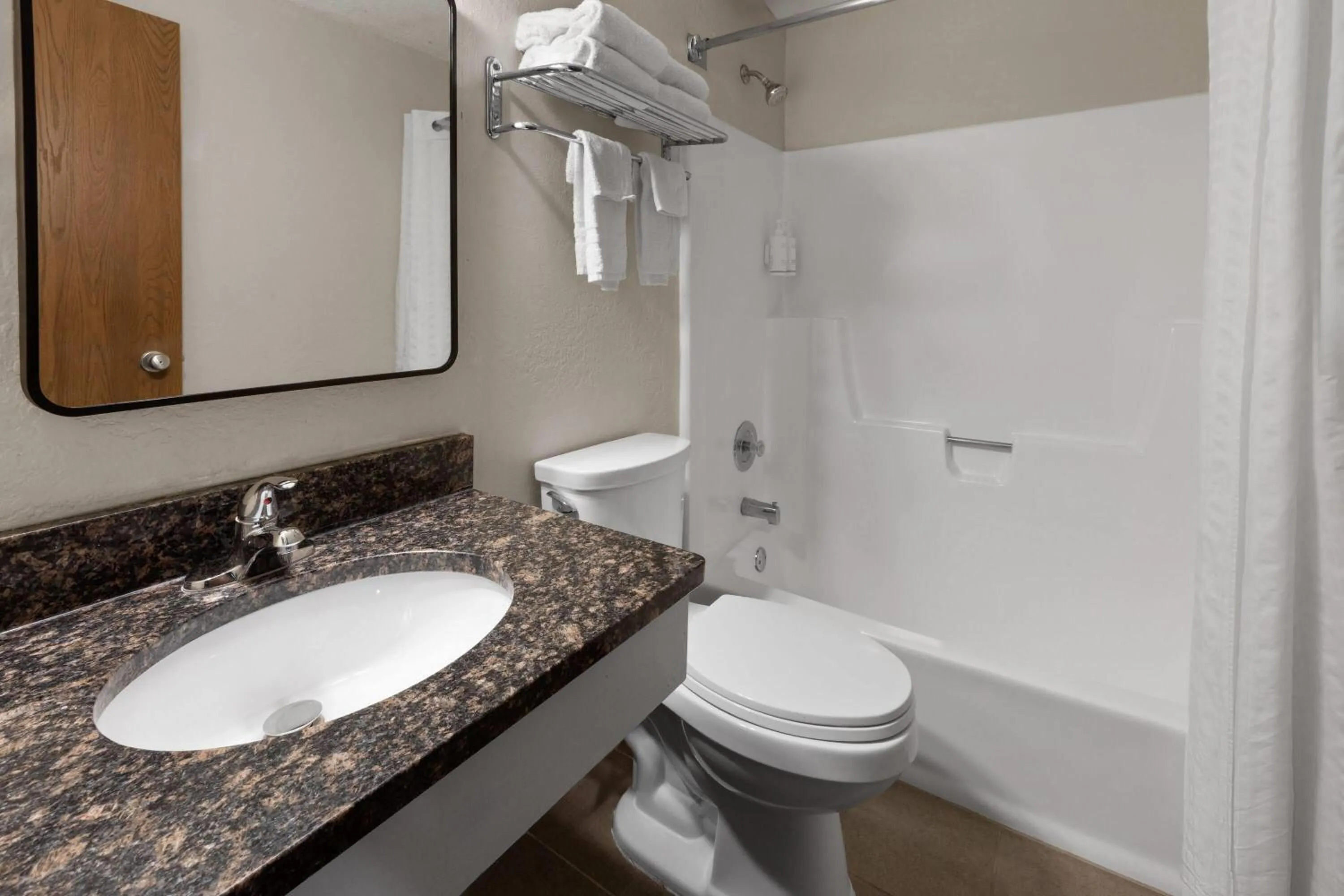 Bathroom in Super 8 by Wyndham Winona MN