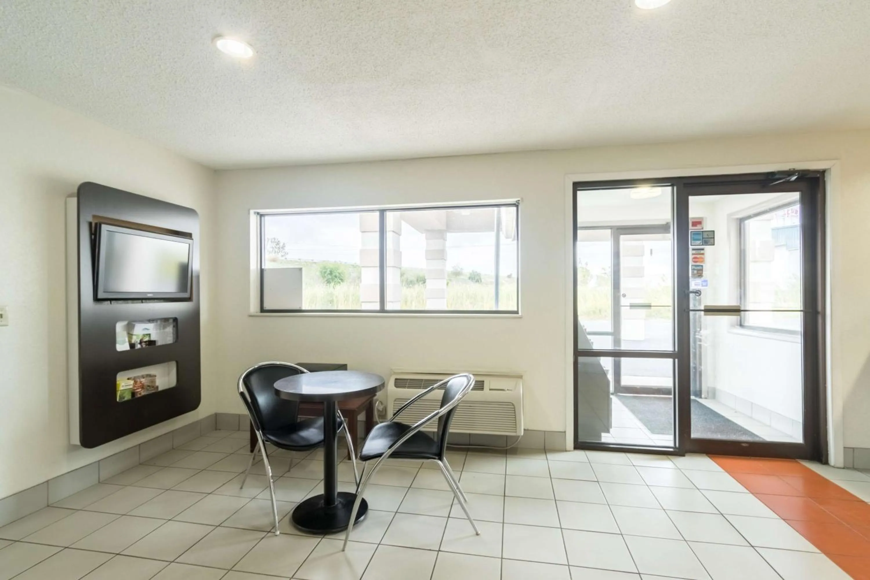 Communal lounge/ TV room in Motel 6-Crawfordsville, IN