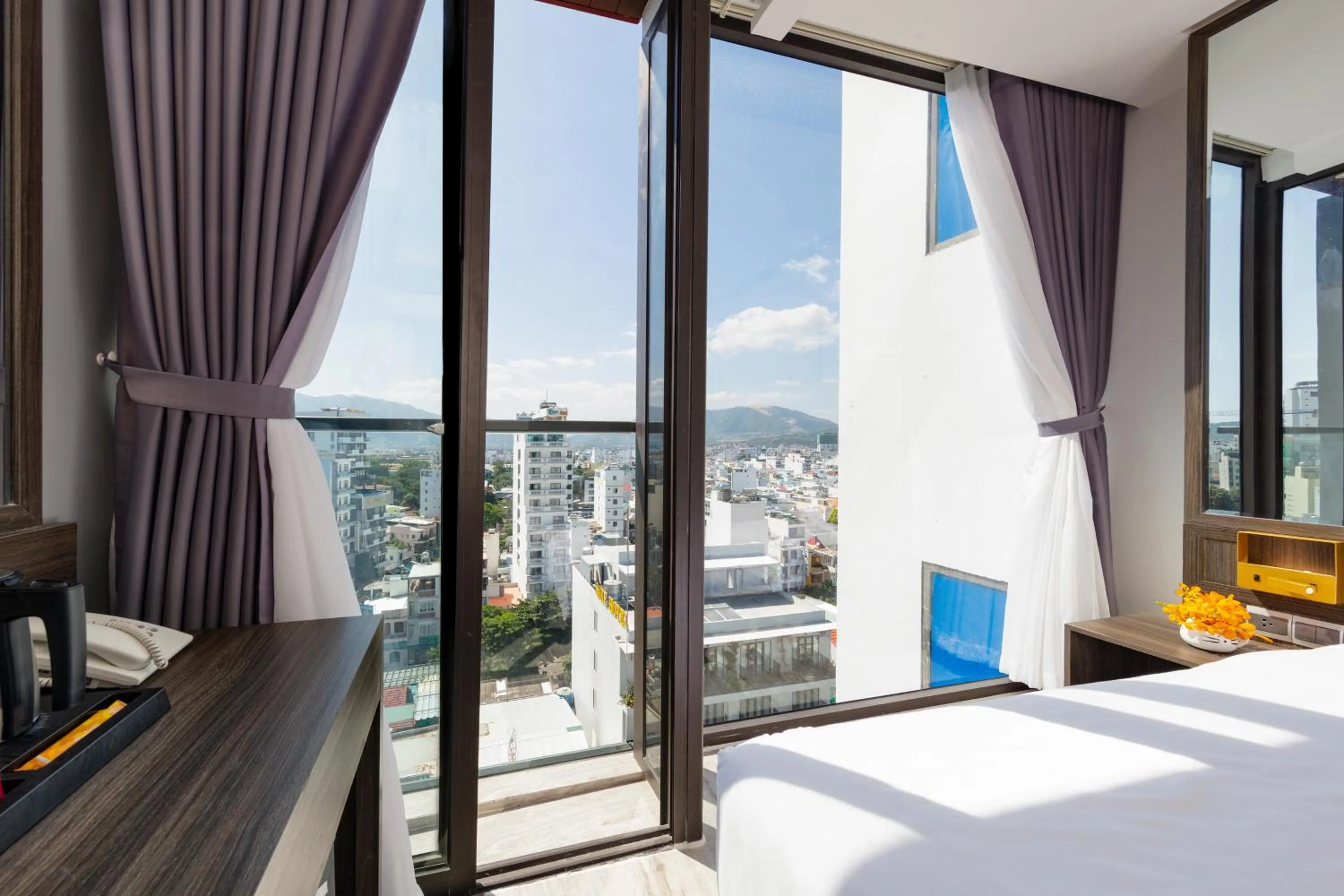 Balcony/Terrace, Bed in Ivy Hotel Nha Trang