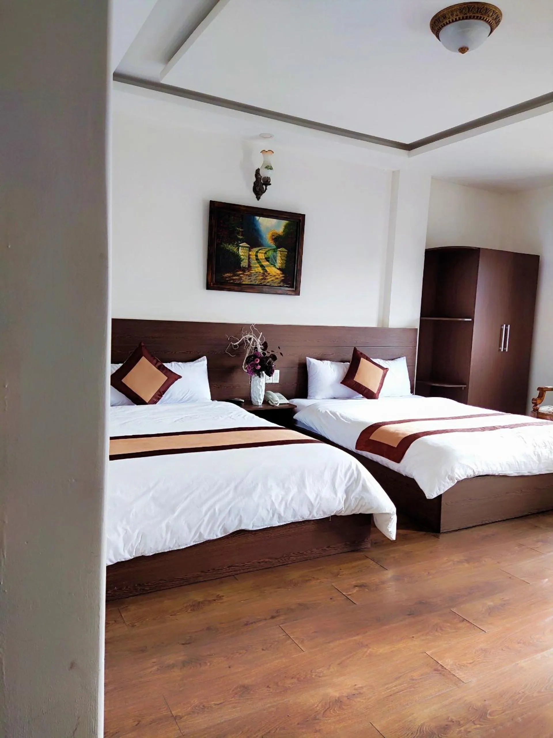 Photo of the whole room, Bed in New Hampton Suits-Tam Xuan Centre Hotel