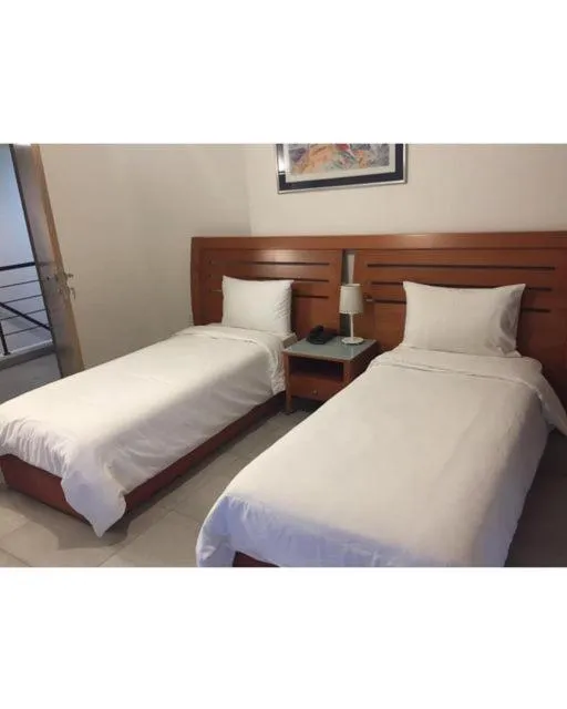 Bed in Brazilia Suites Hotel