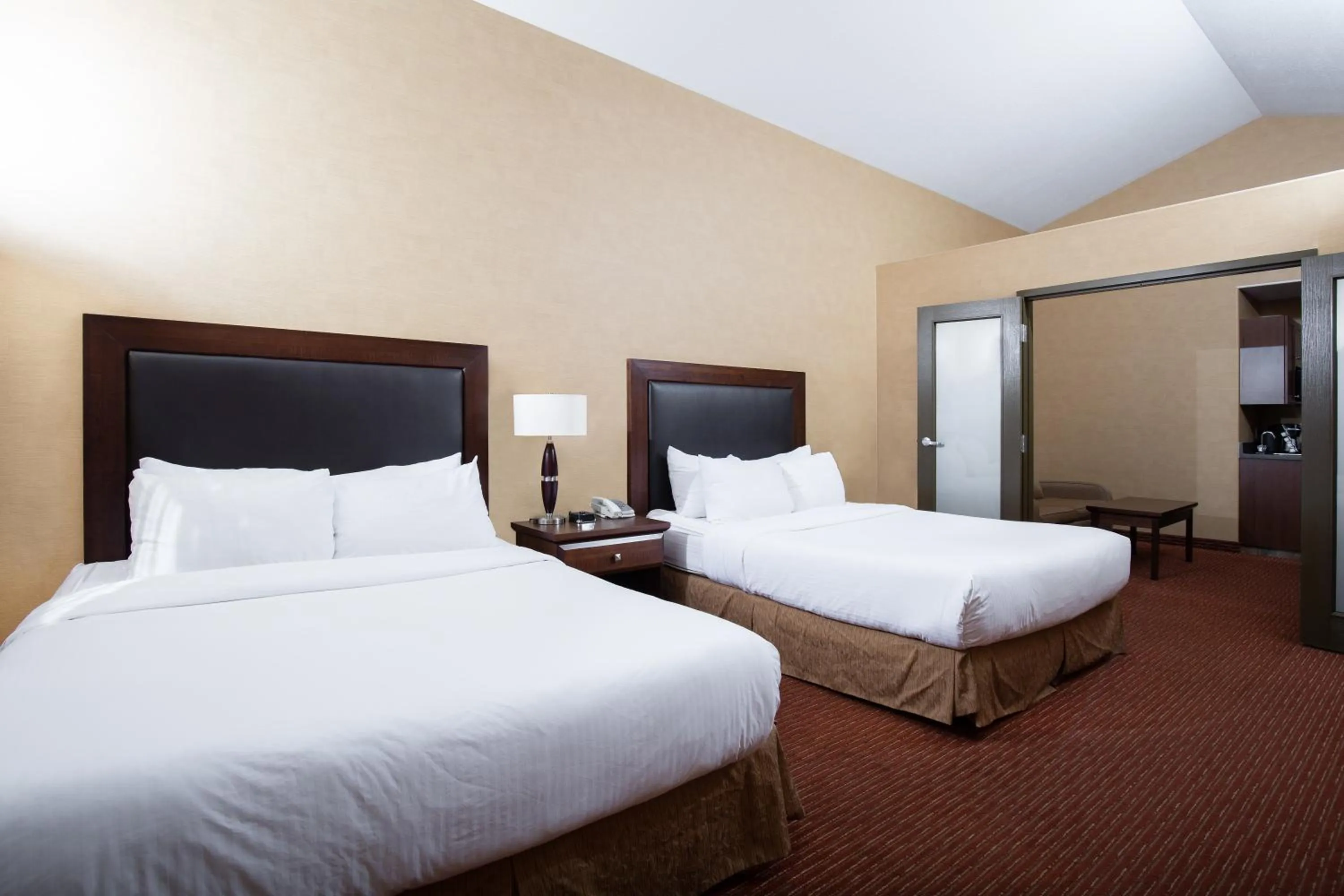 Bed in Pomeroy Hotel Fort St. John