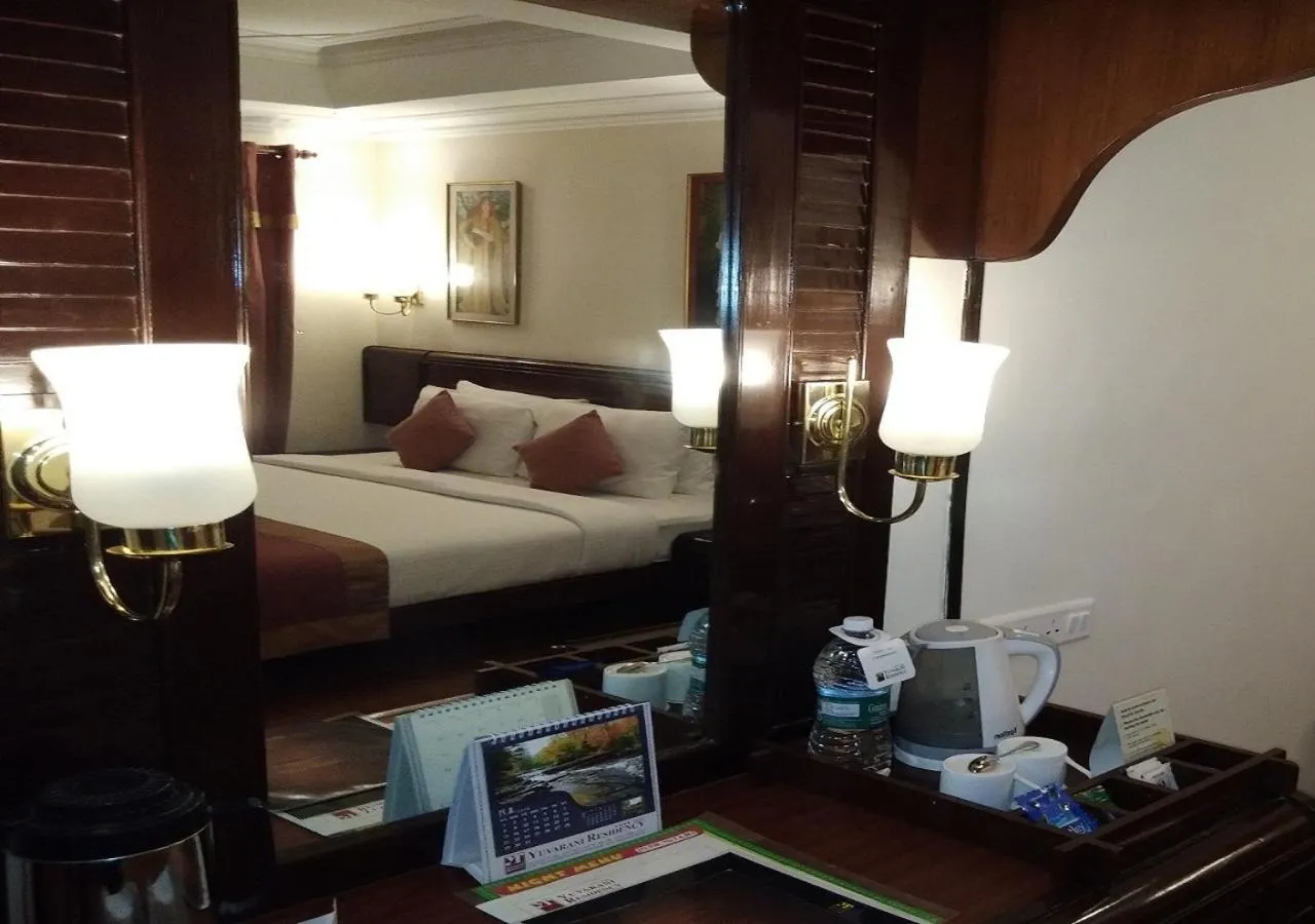 Living room, Bed in Yuvarani Residency