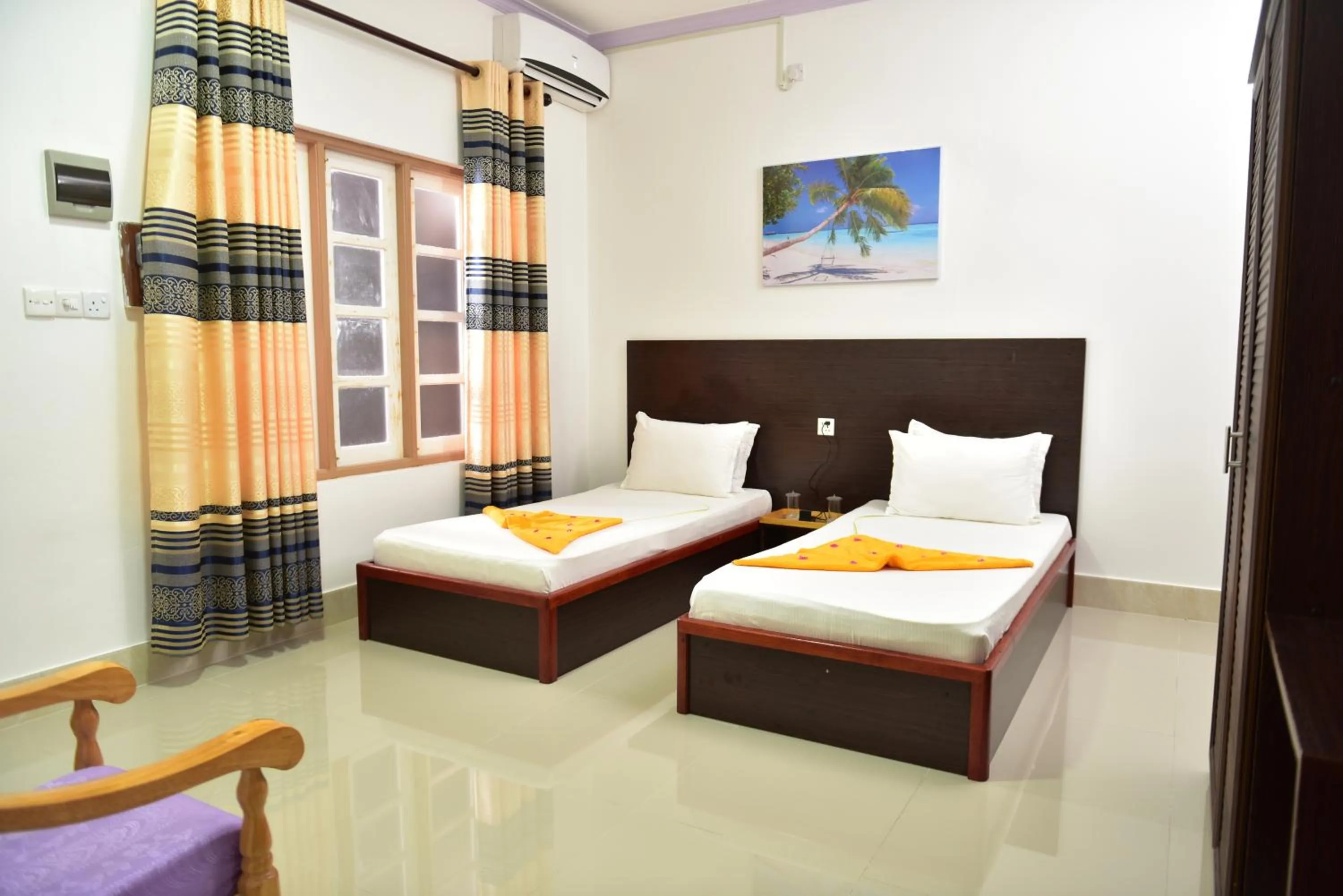 Bed in Moodhumaa Inn