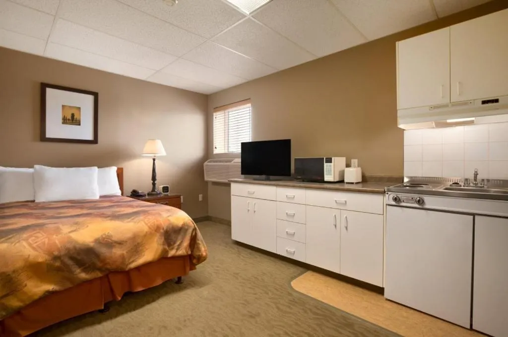 Photo of the whole room, Bed in Central Suite Hotel